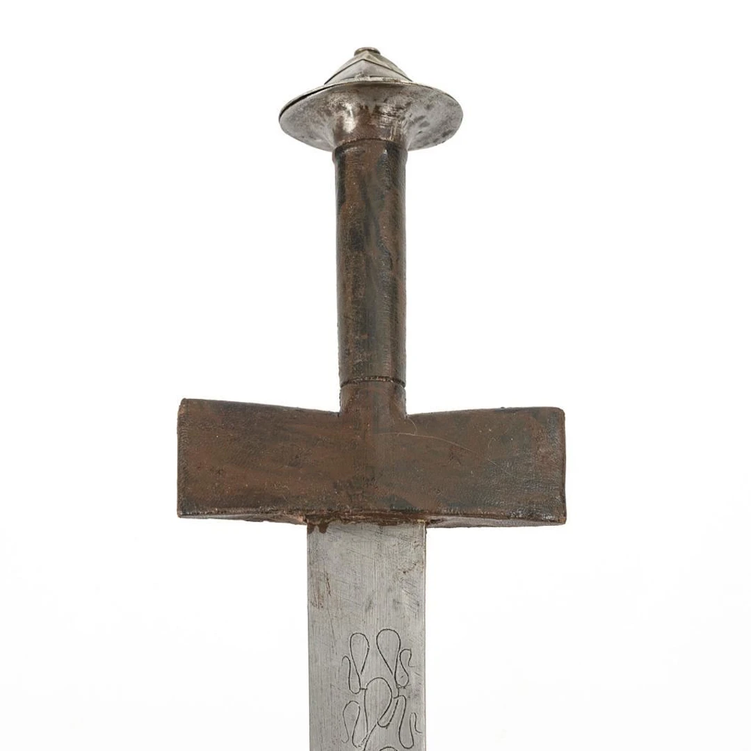 North African sword with leather scabbard.