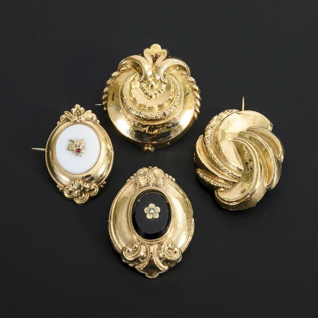 Set of 4 Rolled Gold Brooches.