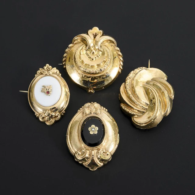 Set of 4 Rolled Gold Brooches.