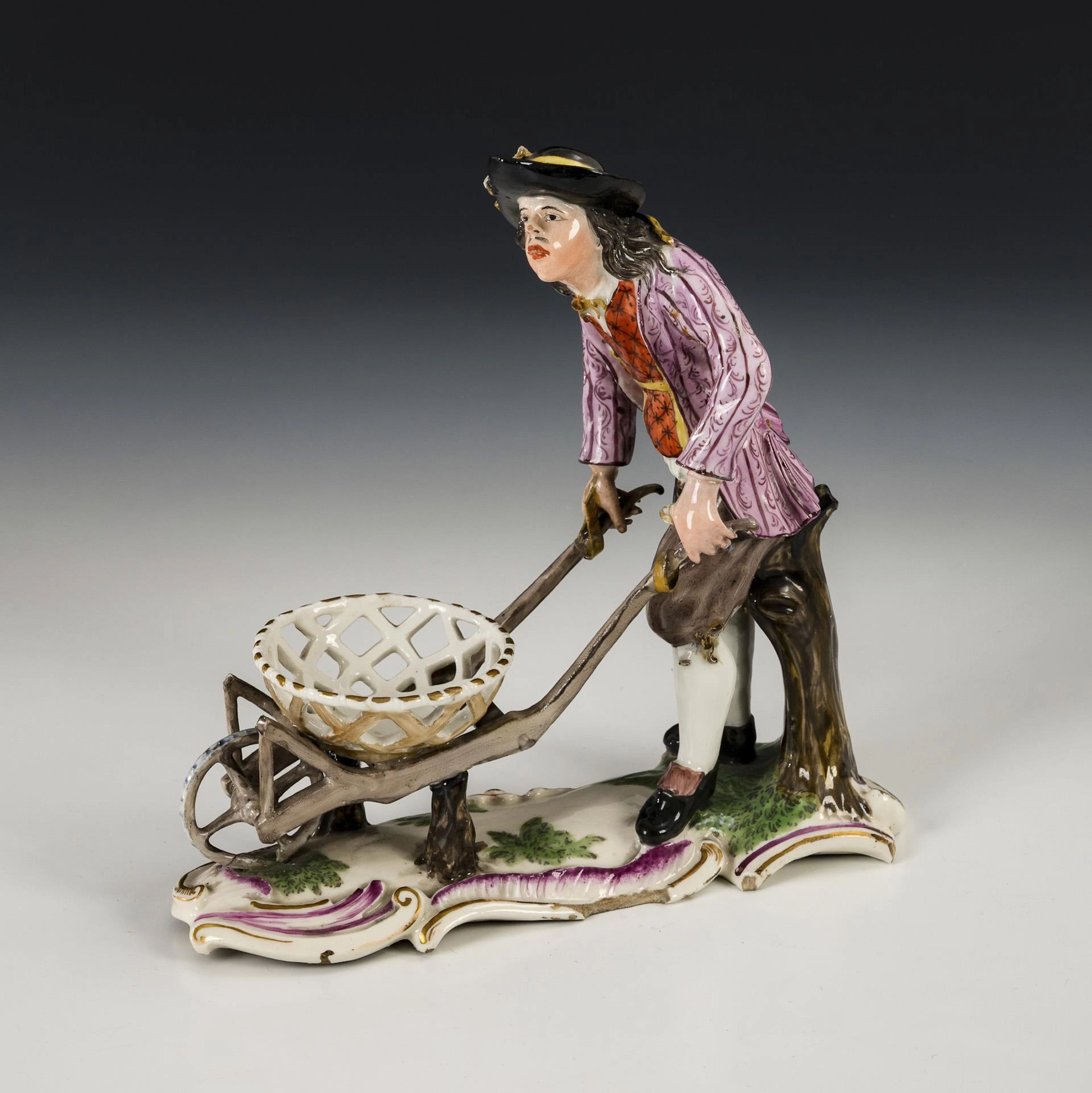 Man with wheelbarrow.