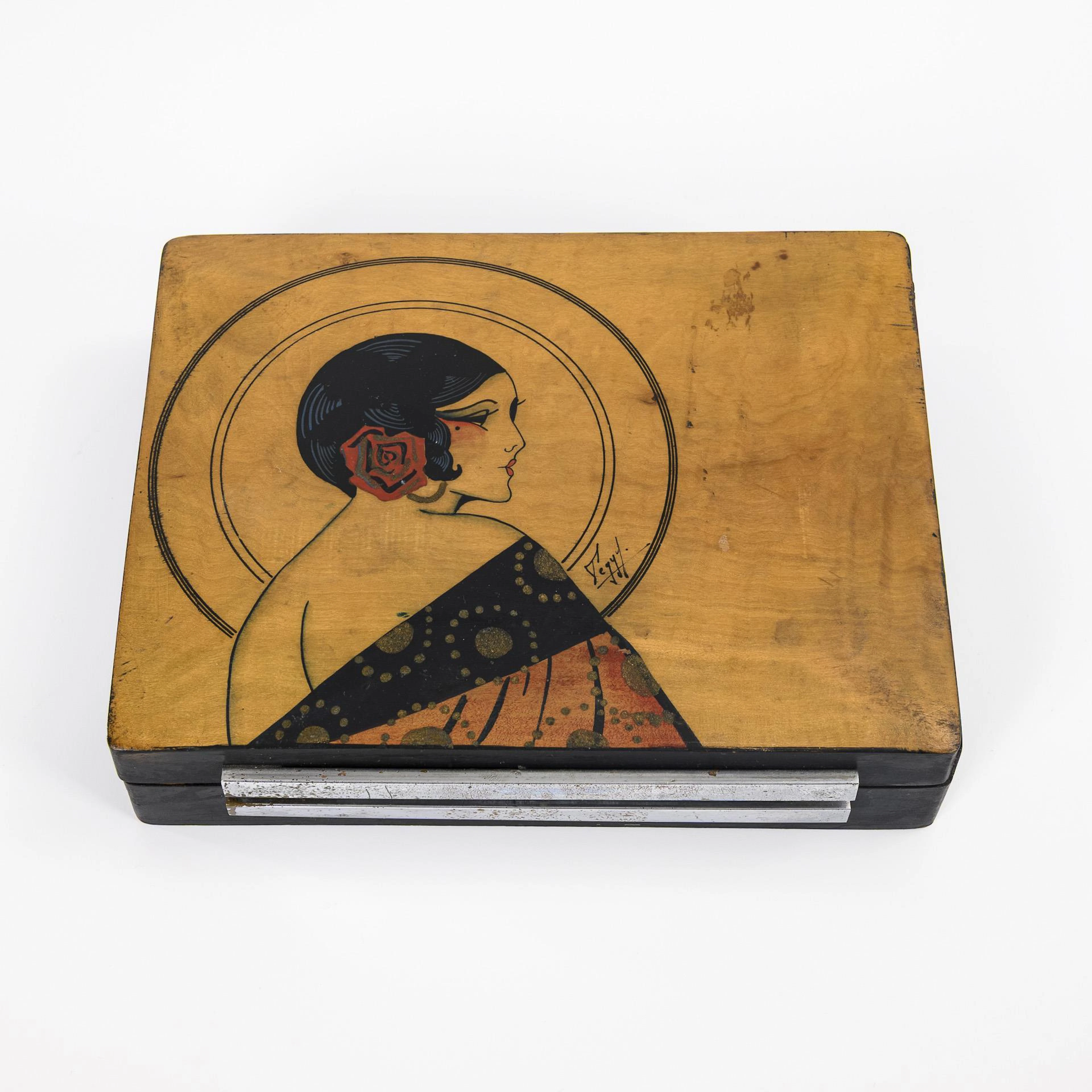 Art deco casket with woman's head.