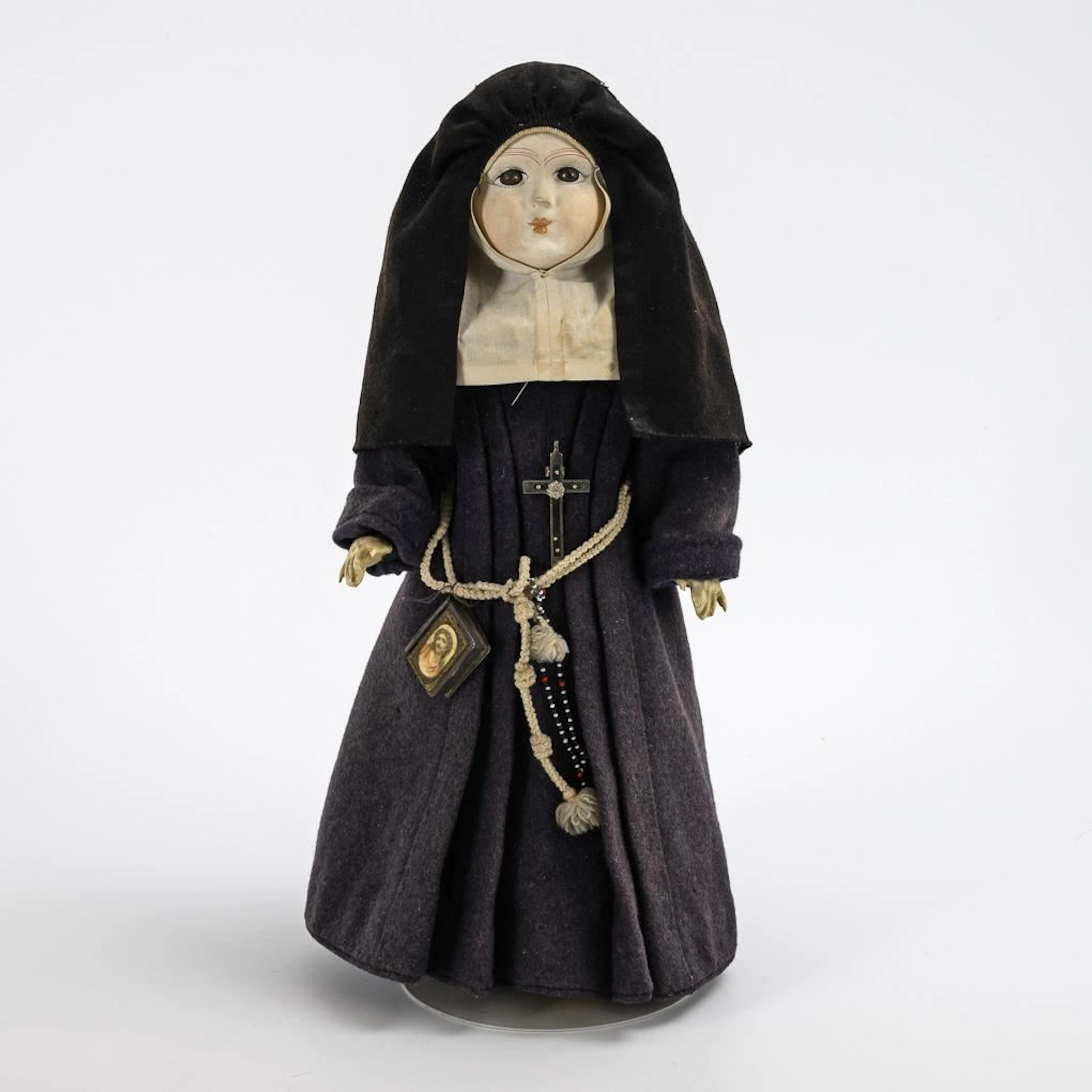 Mannequin dressed as a nun.