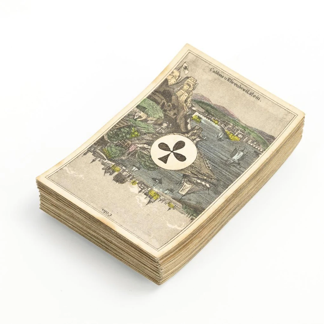 Museum-quality Whist playing cards, aces featuring cityscapes.