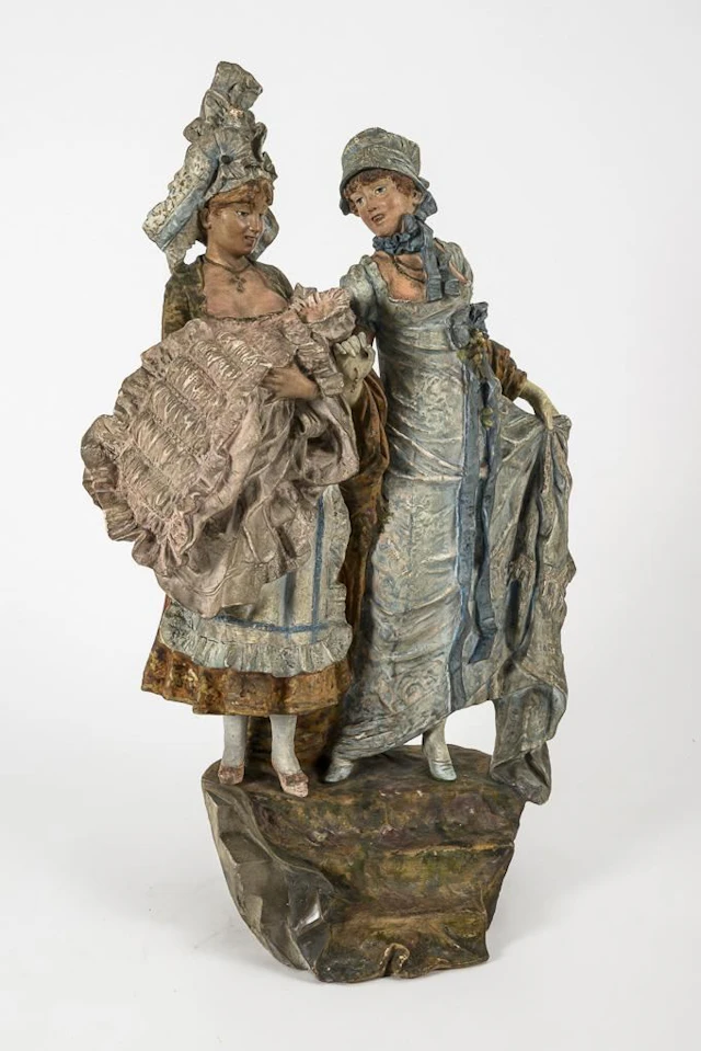 Art Nouveau figurine group depicting a baptism scene.