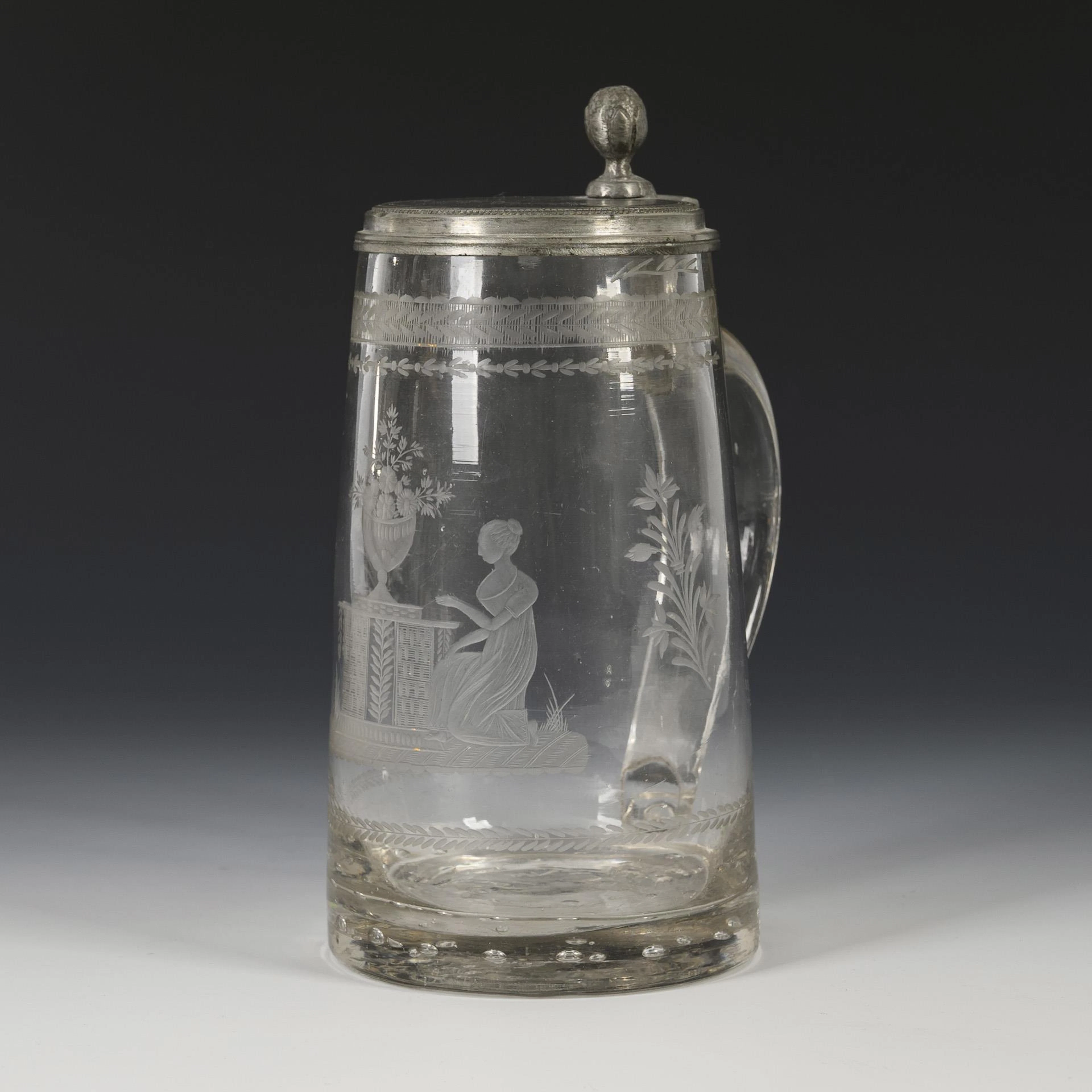 Empire tankard with figure motif.