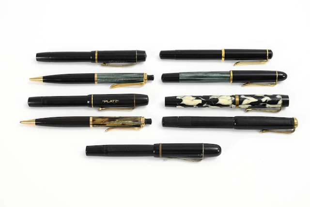 7 fountain pens and 2 mechanical pencils.