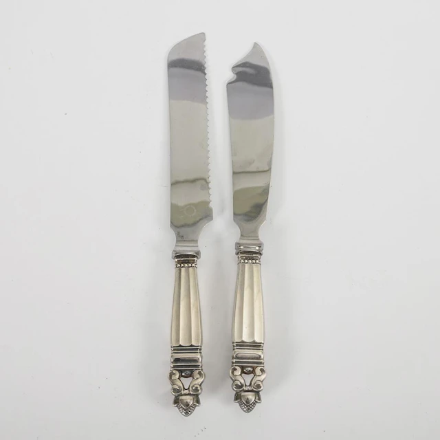 2 "Acorn" serving knives with silver handles. Georg Jensen.