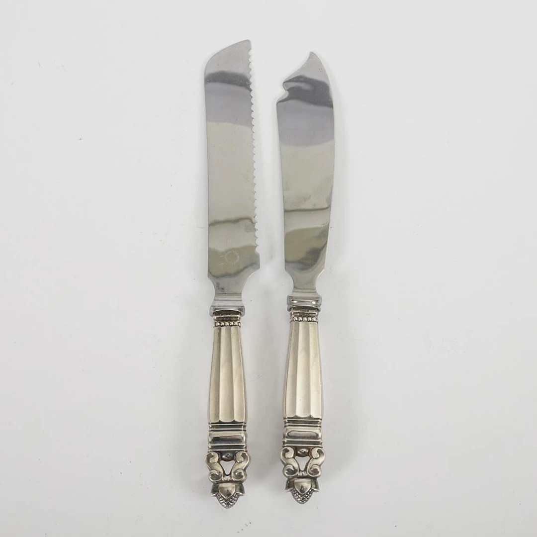2 "Acorn" serving knives with silver handles. Georg Jensen.