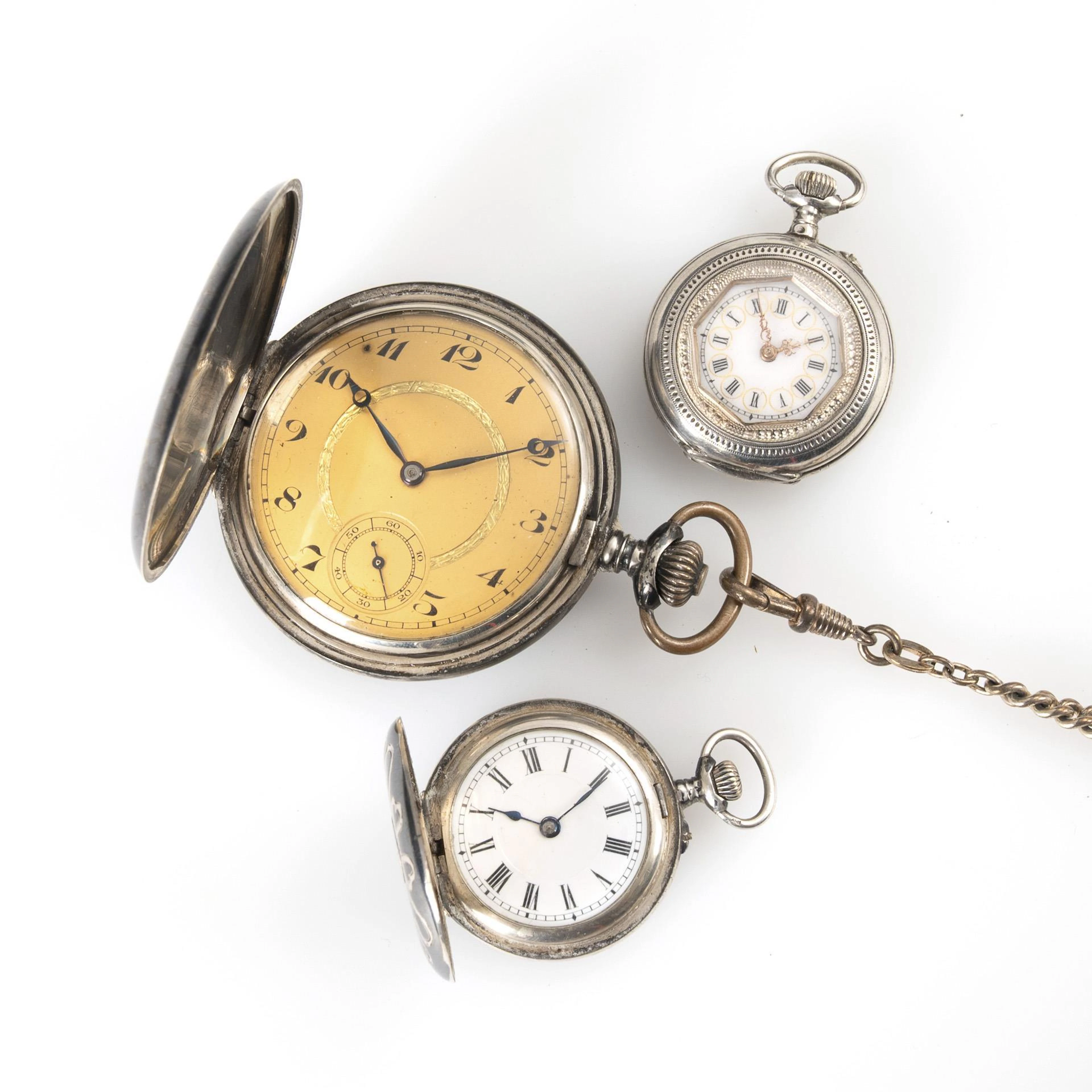 2 silver Art Nouveau spring lid clocks with niello decoration and