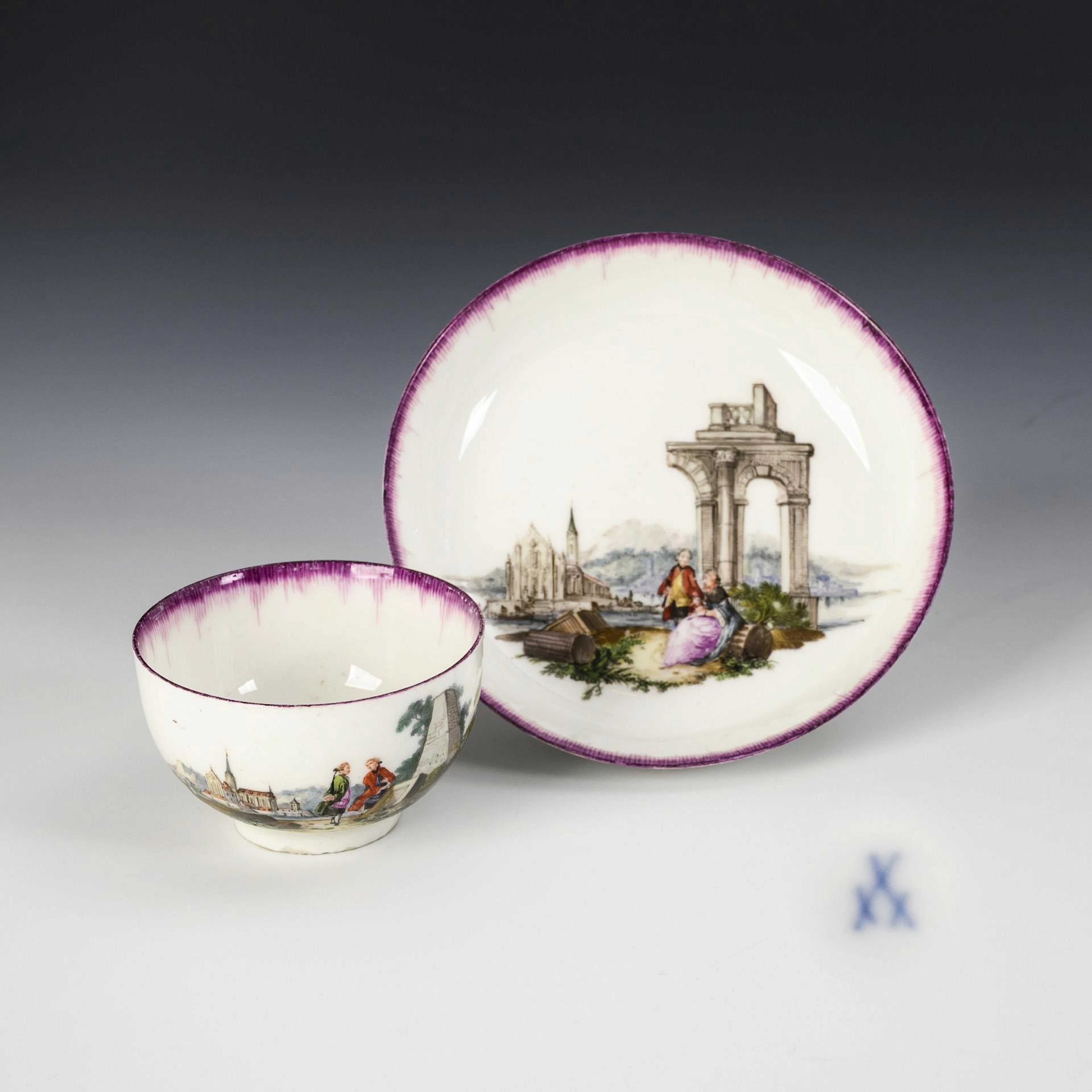 Baroque cup with landscape and figure painting. Meissen.