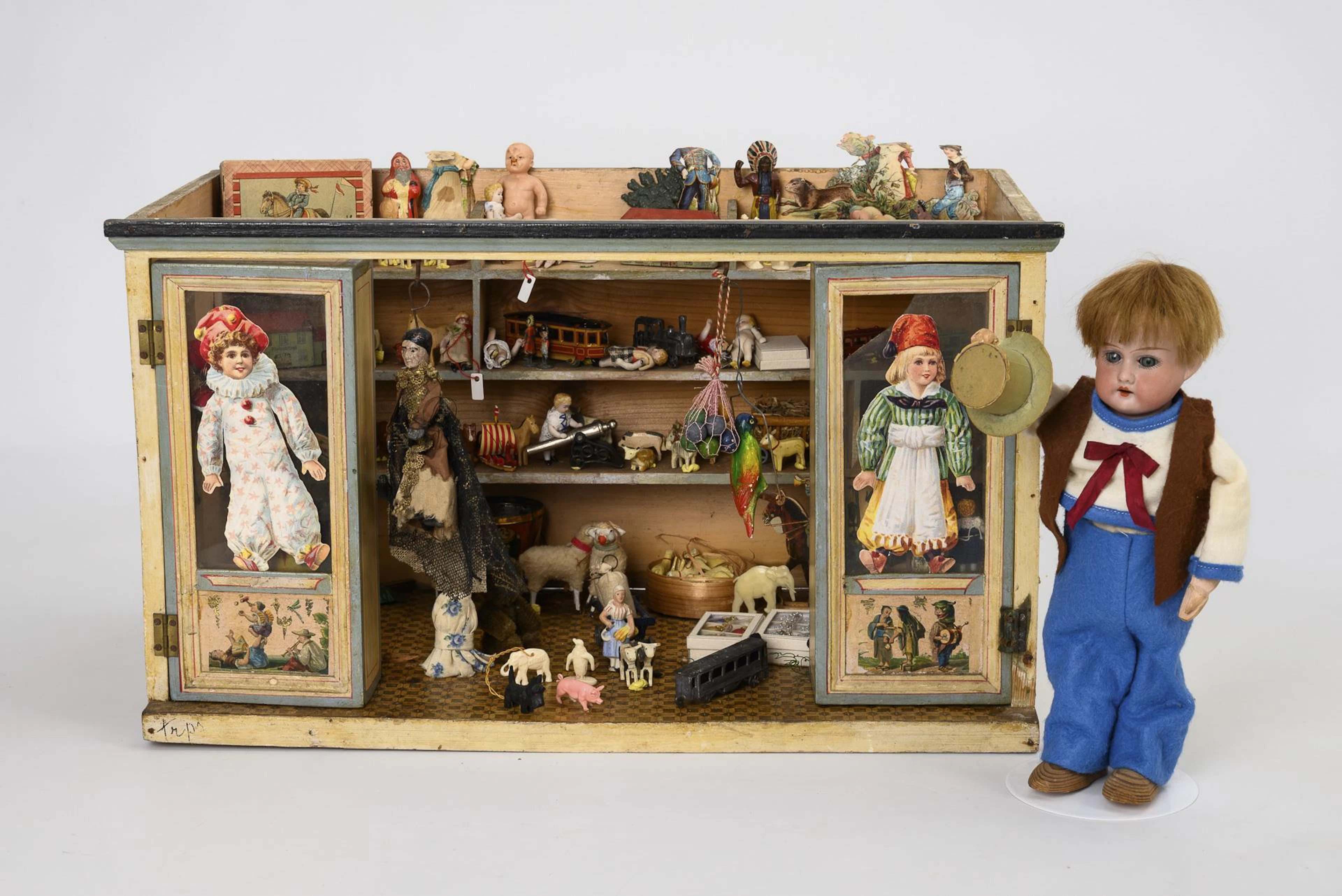 Small toy store and doll.