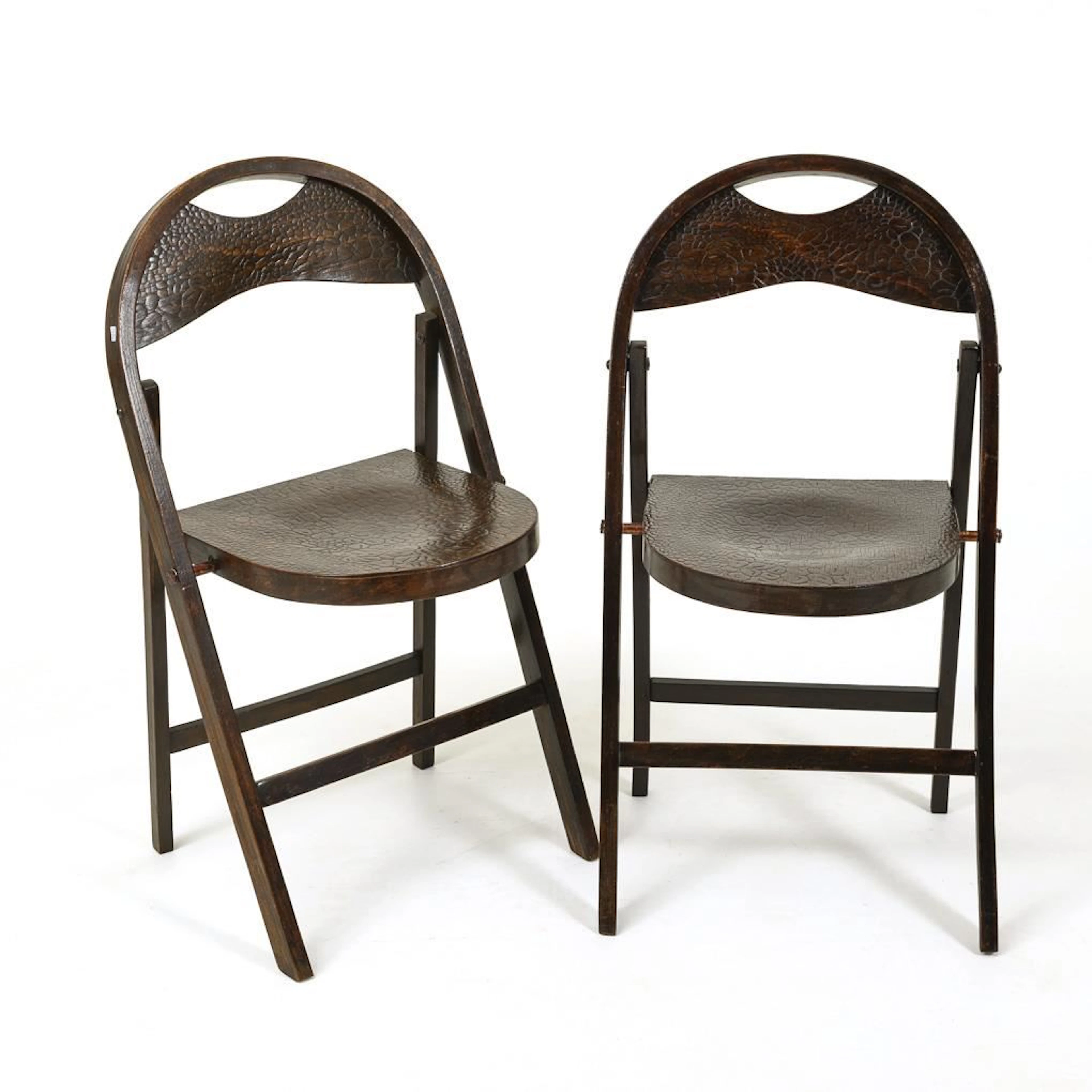 A pair of exceptional bentwood folding chairs.