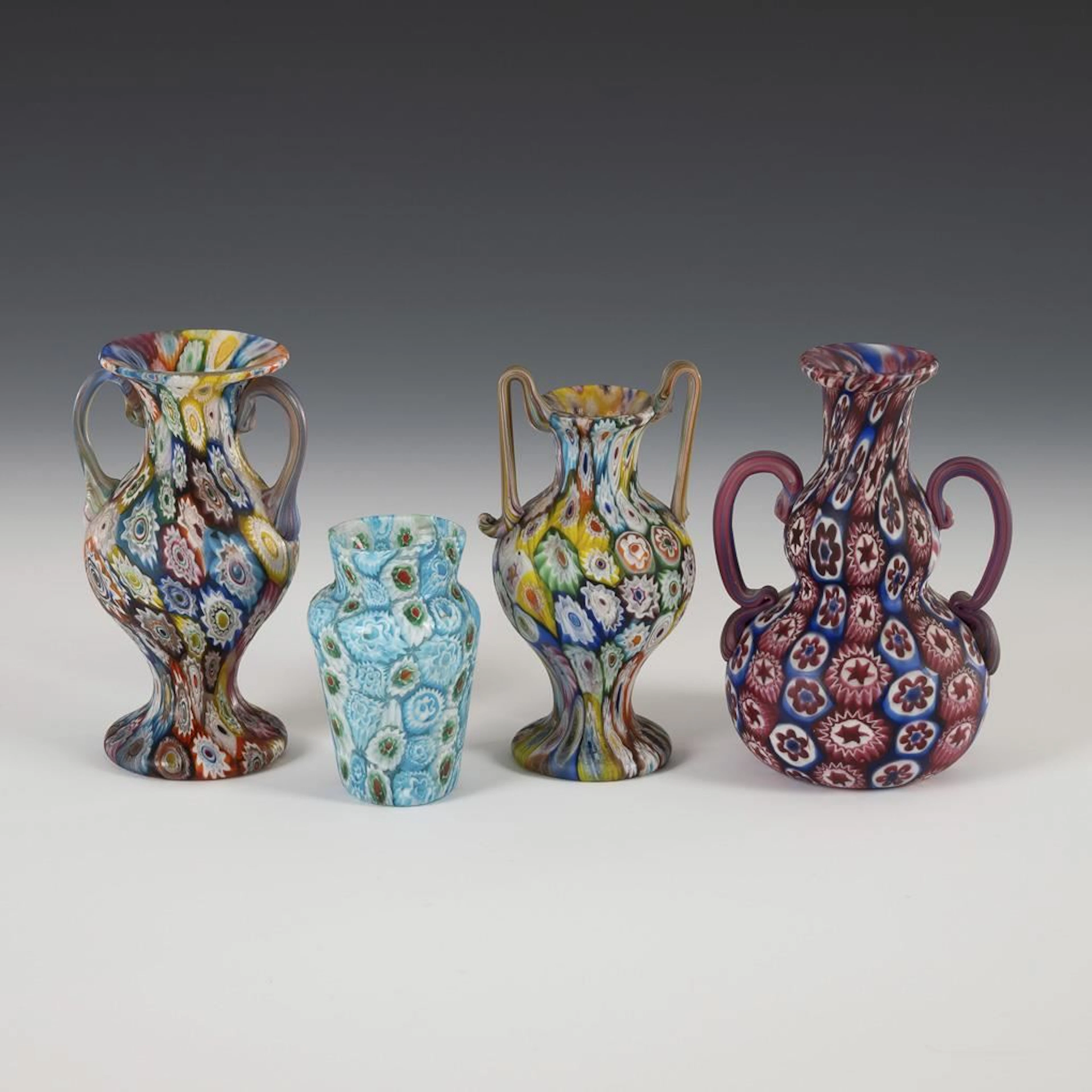4 small millefiori vases. Murano.