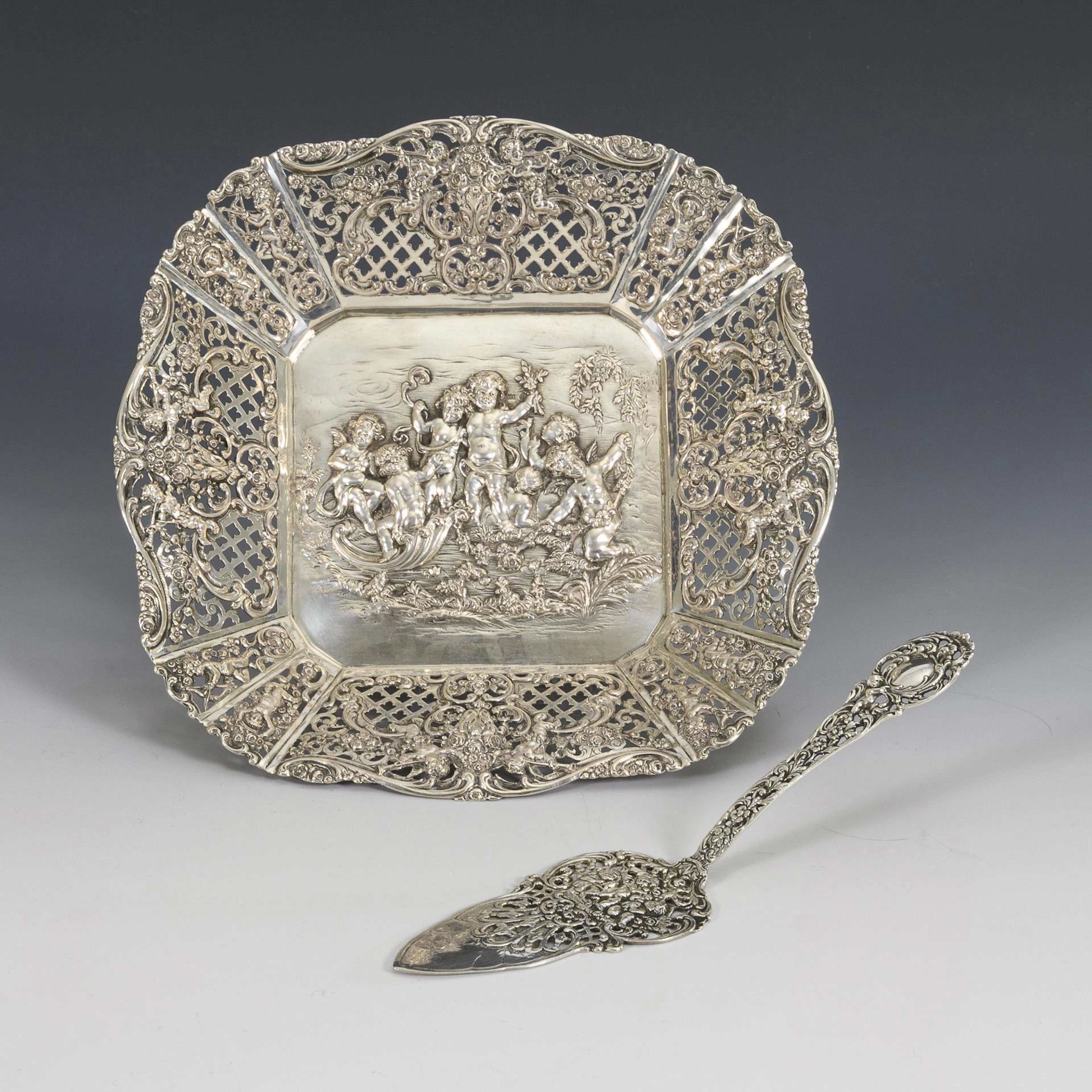 Relief silver bowl and cake server.