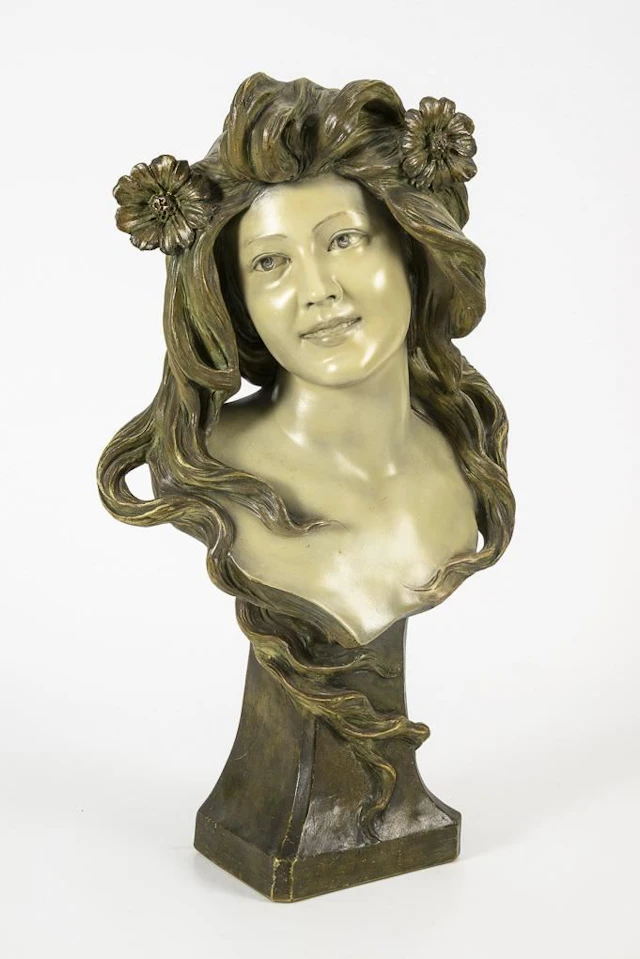 Art Nouveau bust of a nymph.