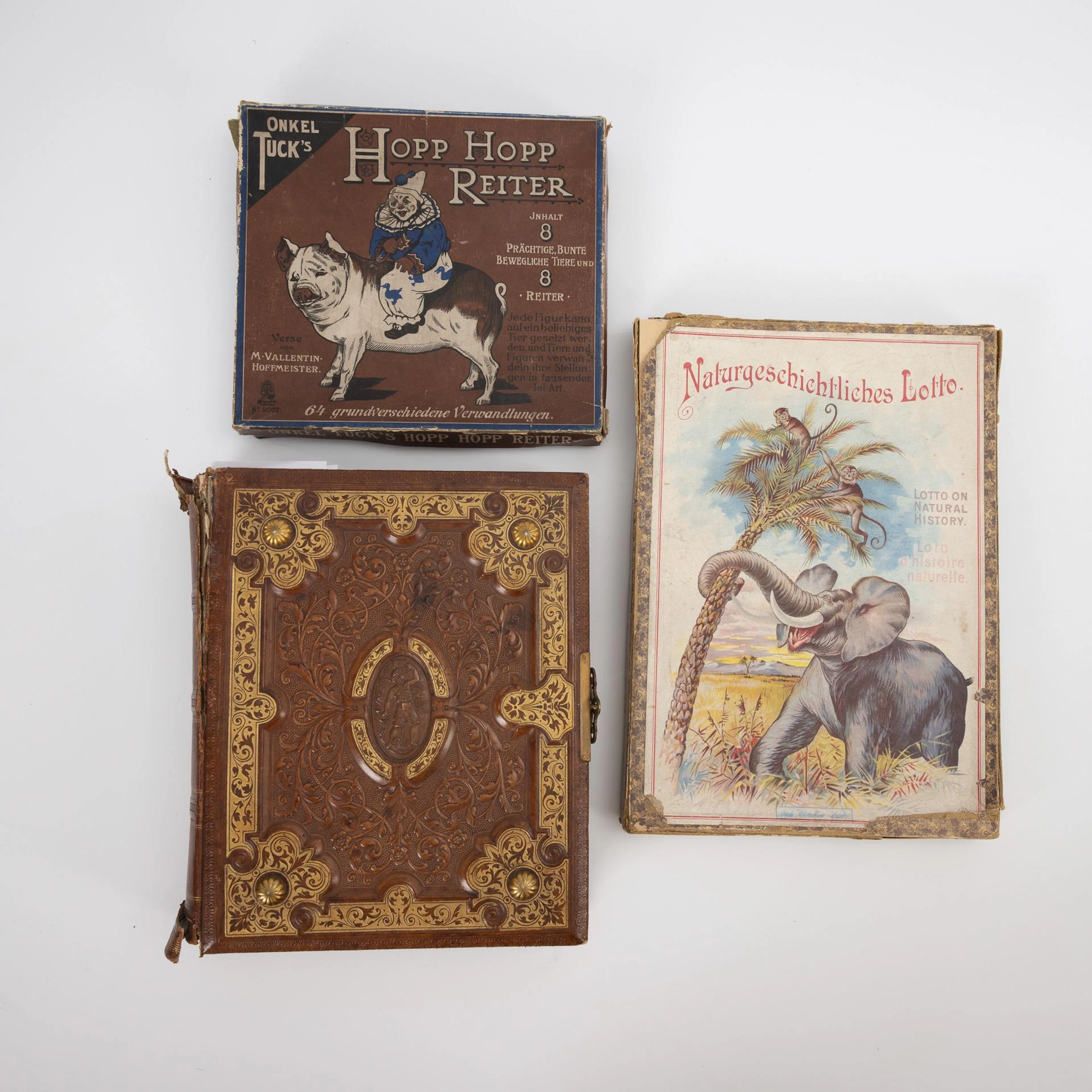 2 old children's games and a paper decorations album.