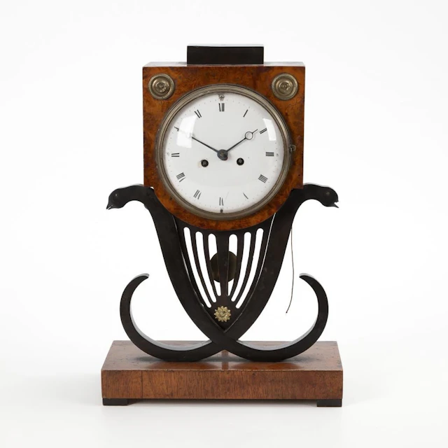 Empire-style mantle clock in need of restoration.