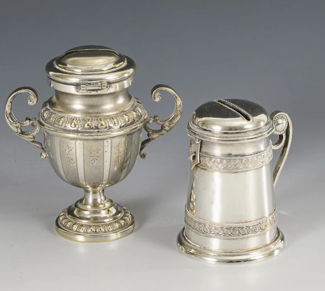 2 antique money boxes.
