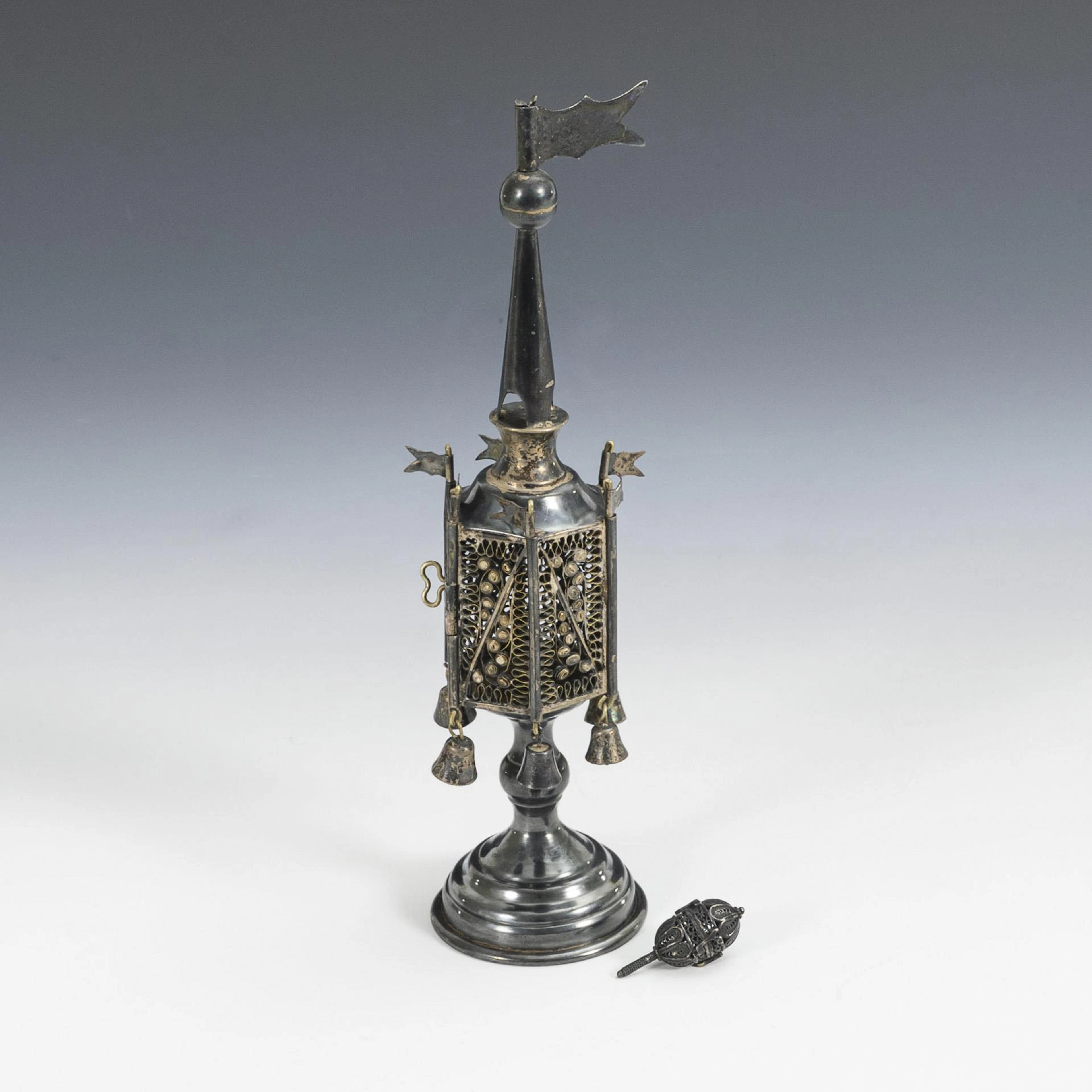 Besamim tower and Hanukkah dreidel.