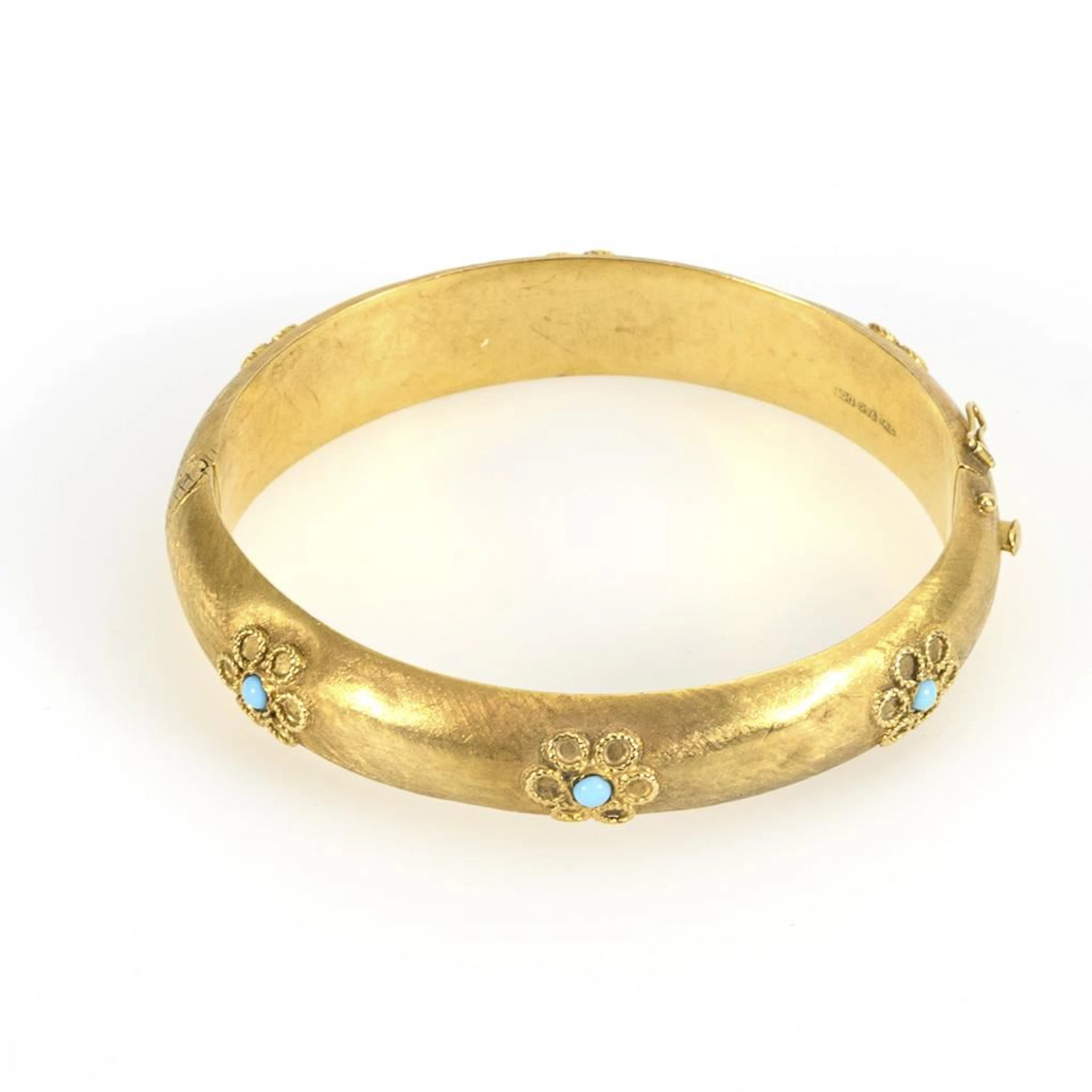 Bangle with floral design.