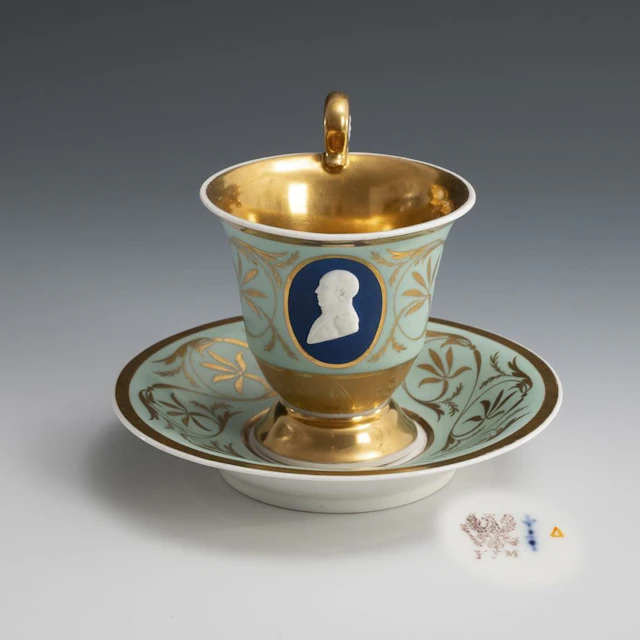 Cup with bisque portrait: Friedrich Franz. KPM Berlin.