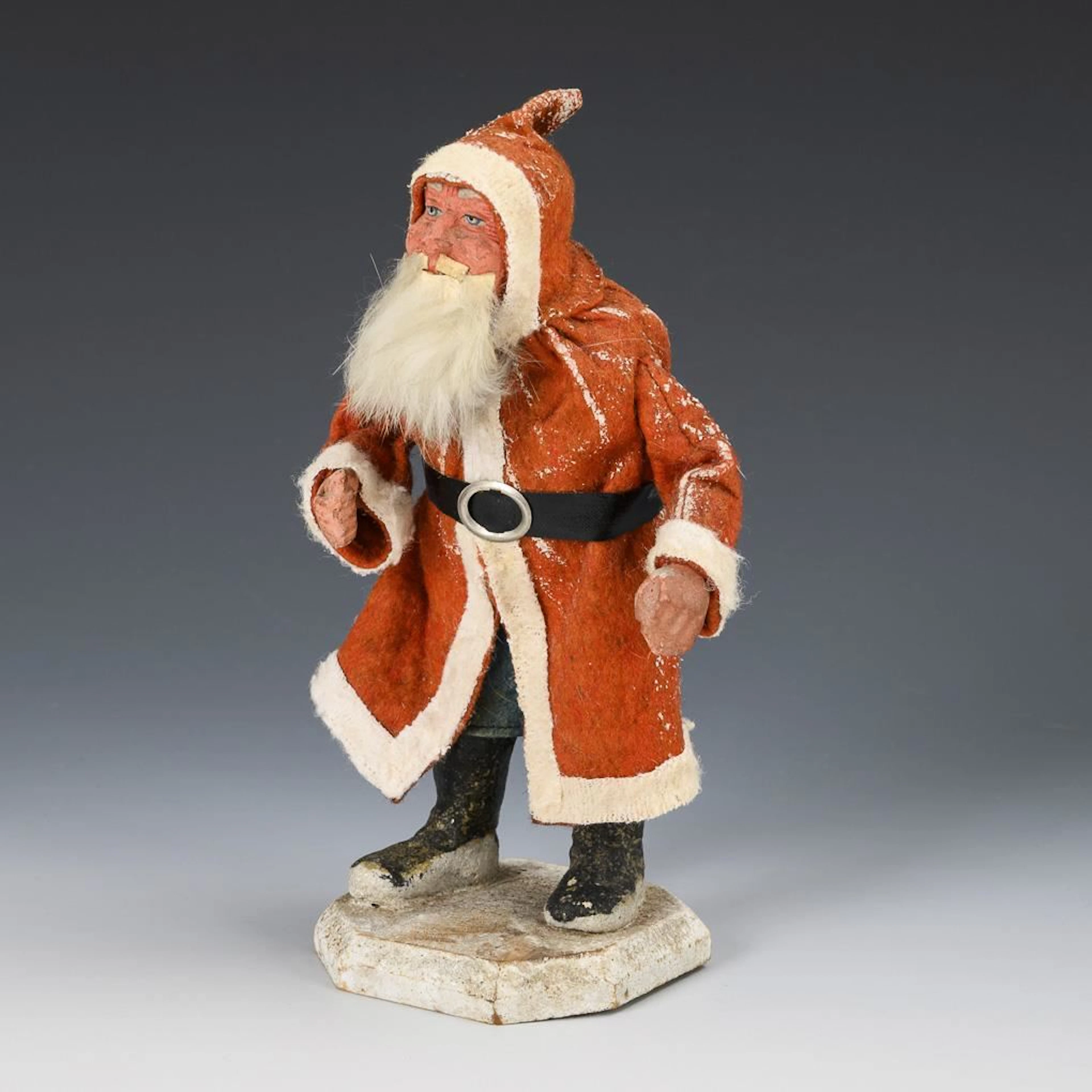 Santa Claus on an octagonal base.