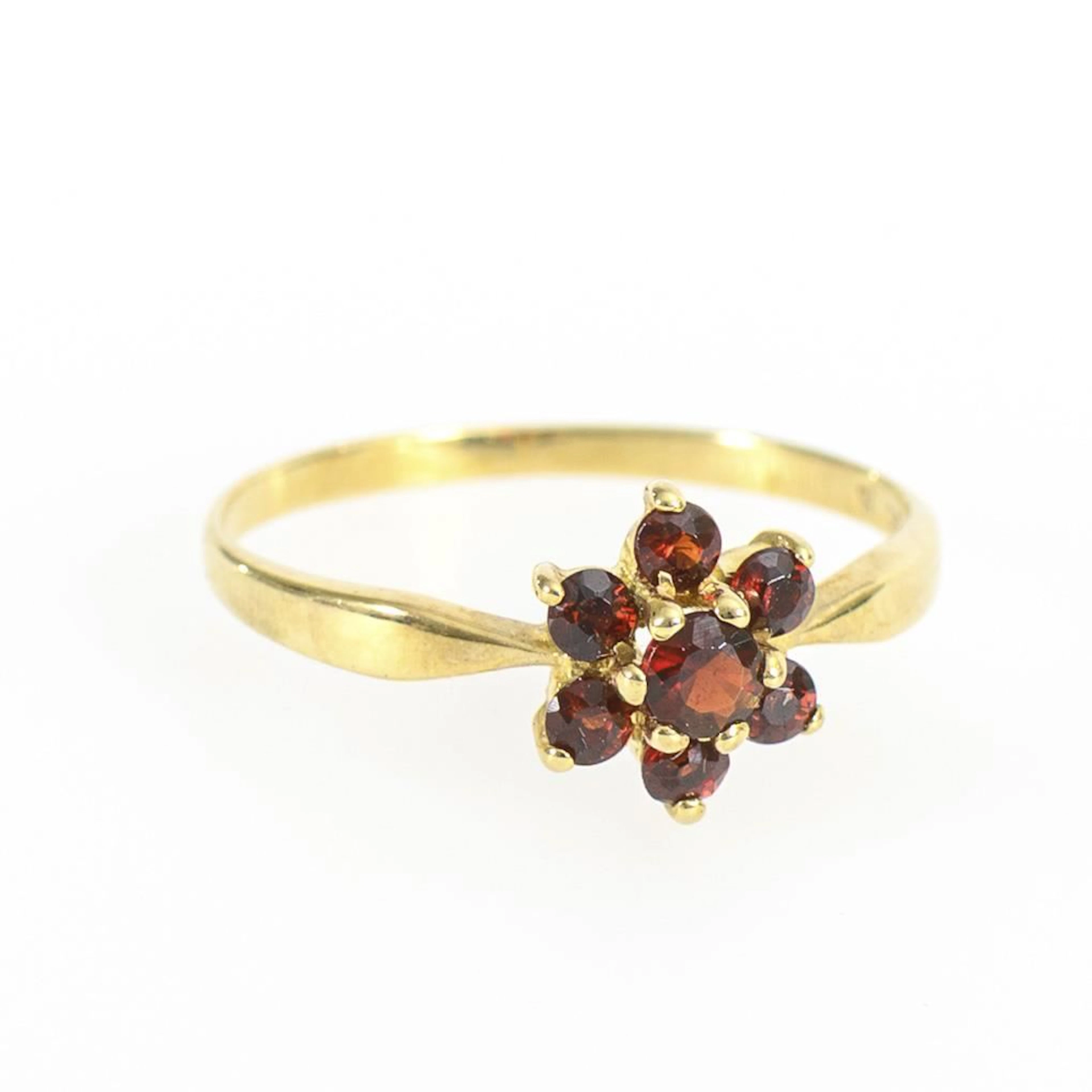 Delicate ring with a pomegranate blossom.