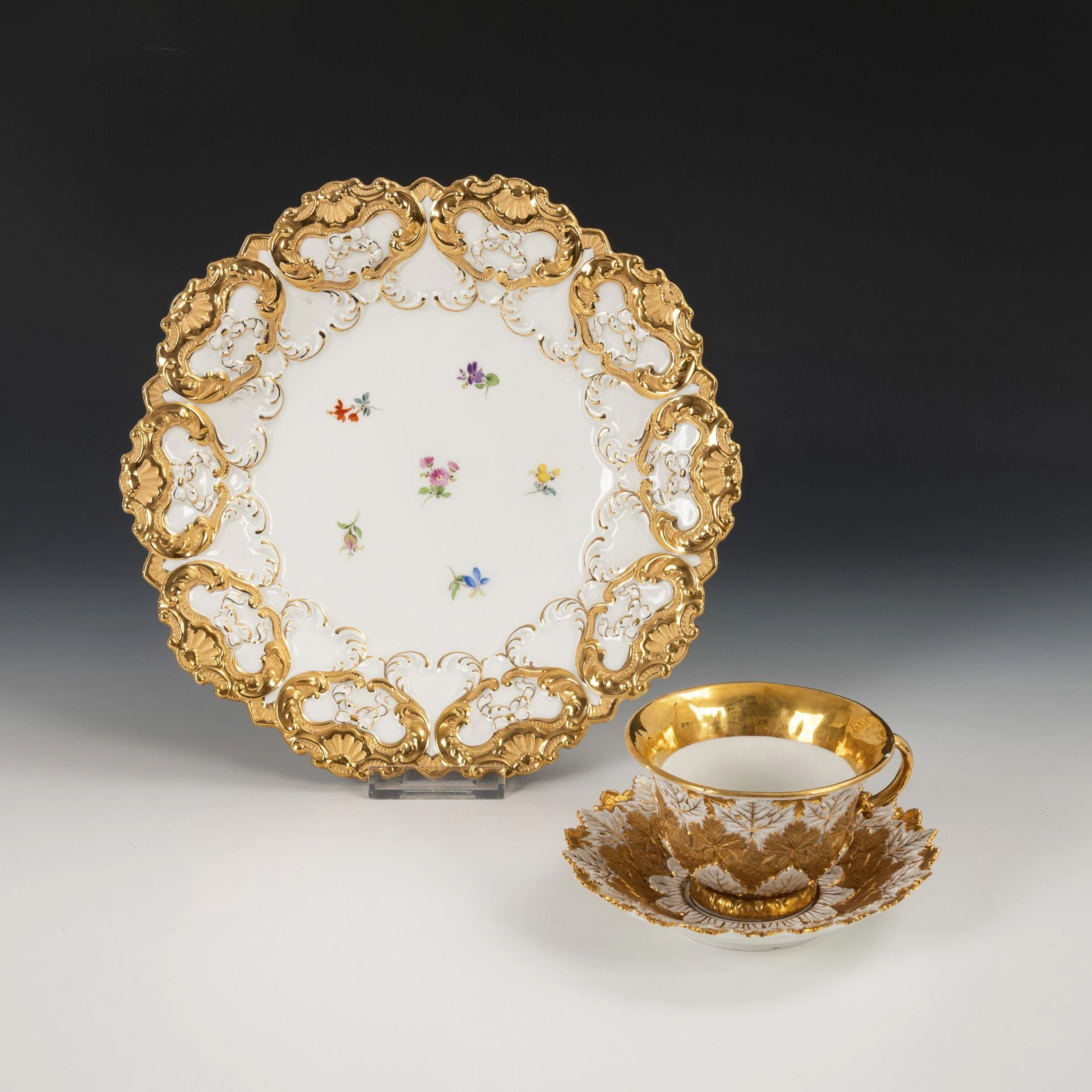 Patterned plate and relief cup. Meissen.