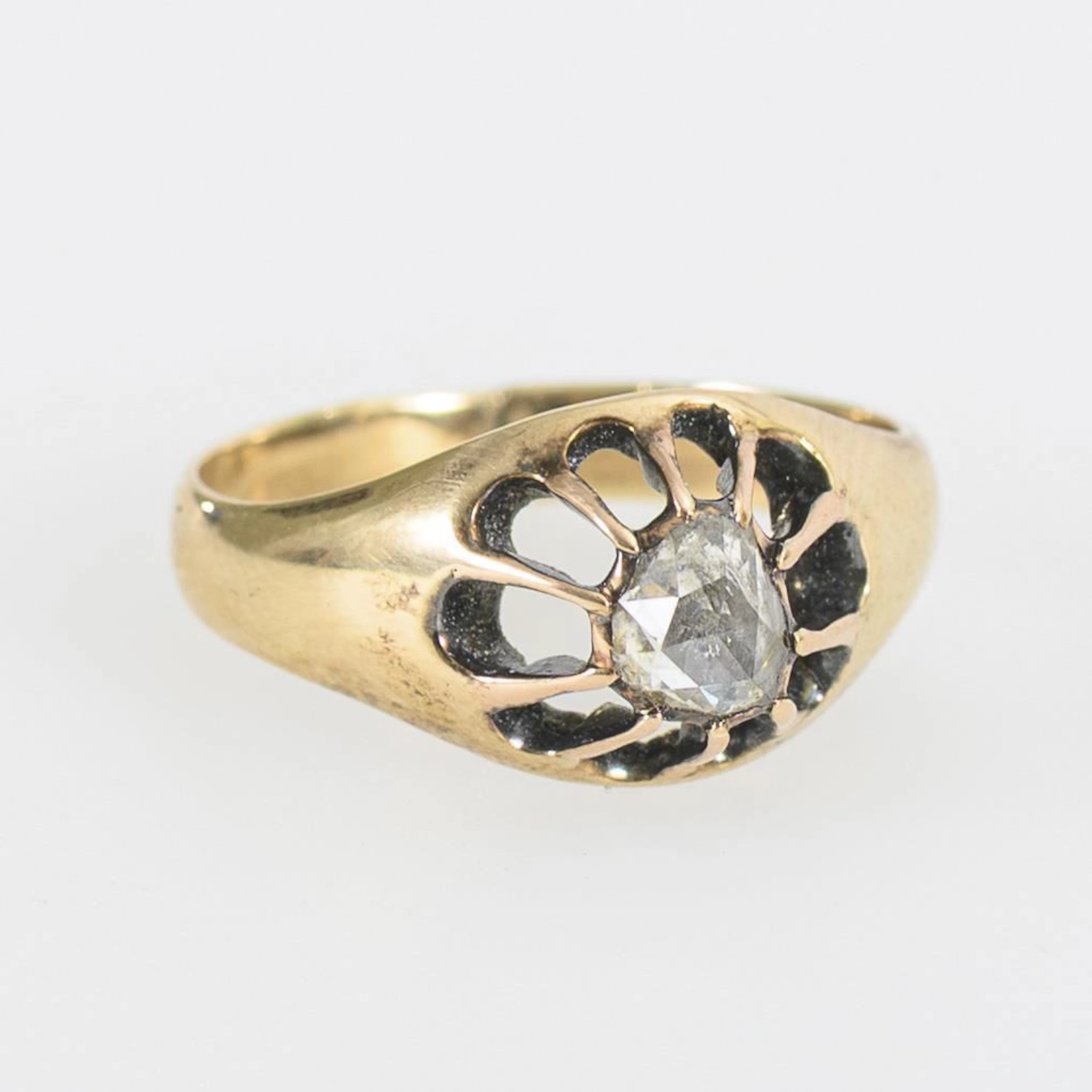 Ring with a rose-cut diamond.