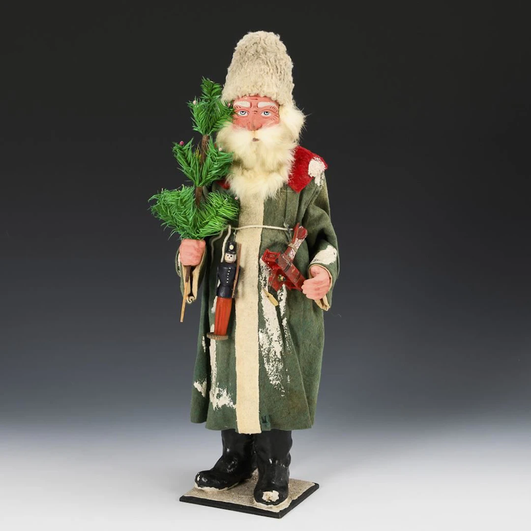 Candybox Santa Claus with a green coat, in its original cardboard