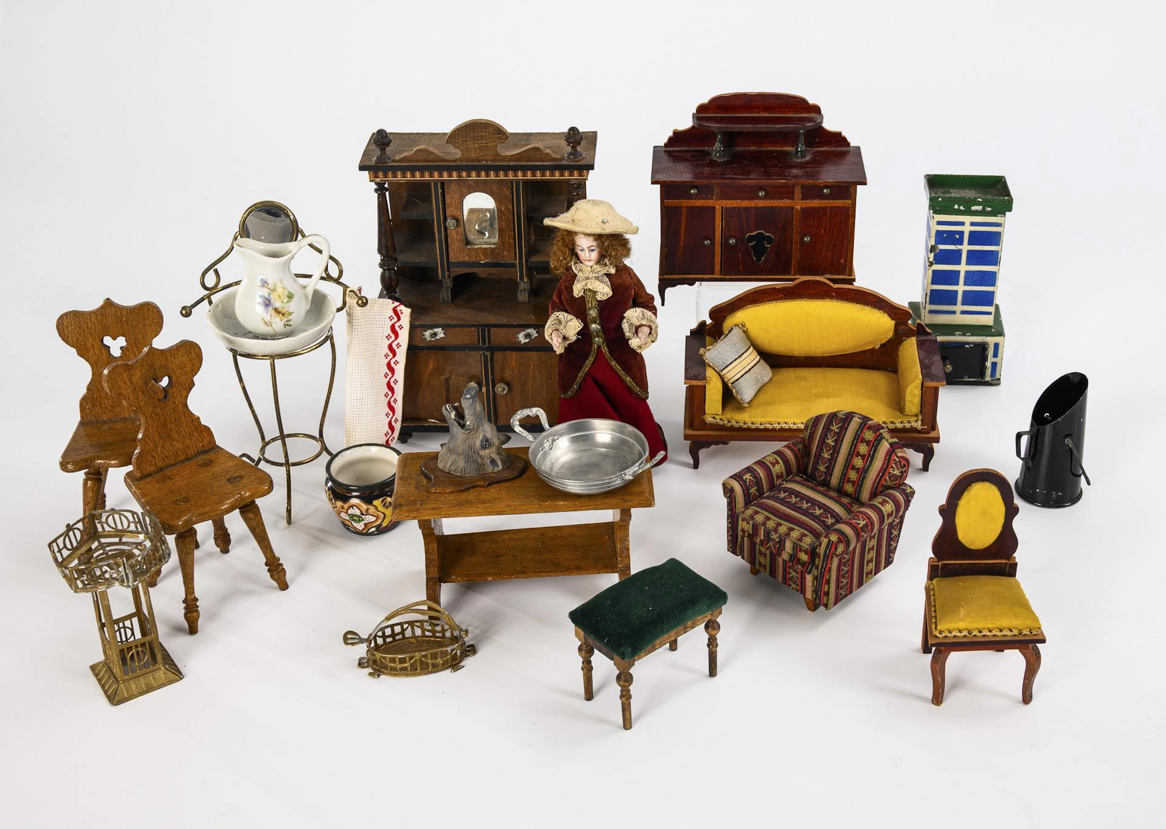 A collection of doll's house furniture.