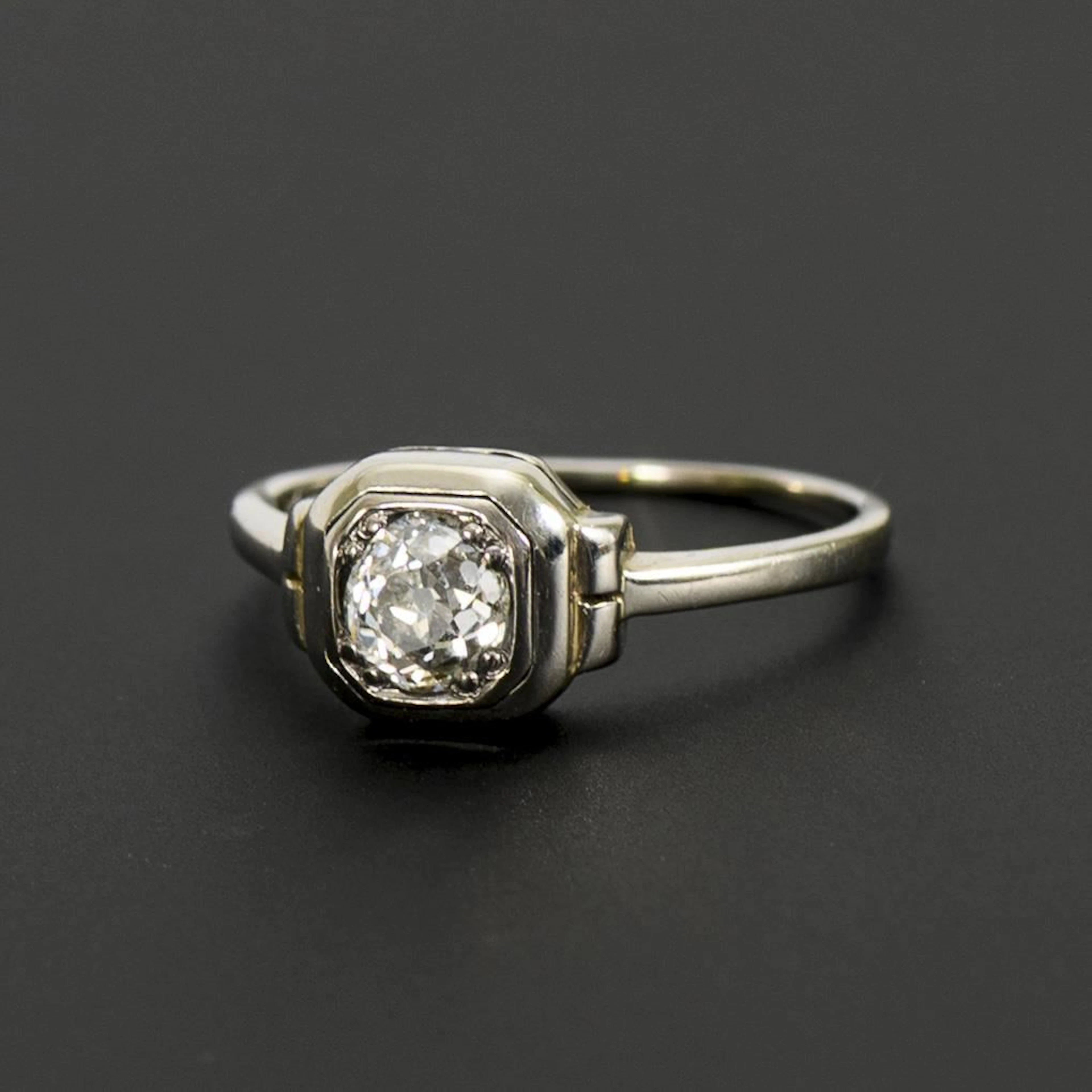 Delicate Art Deco ring with an old-cut solitaire.