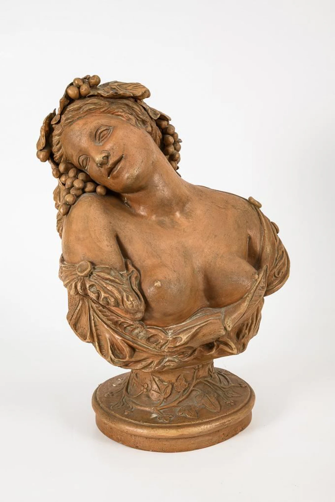 Bust of a woman with grapevines