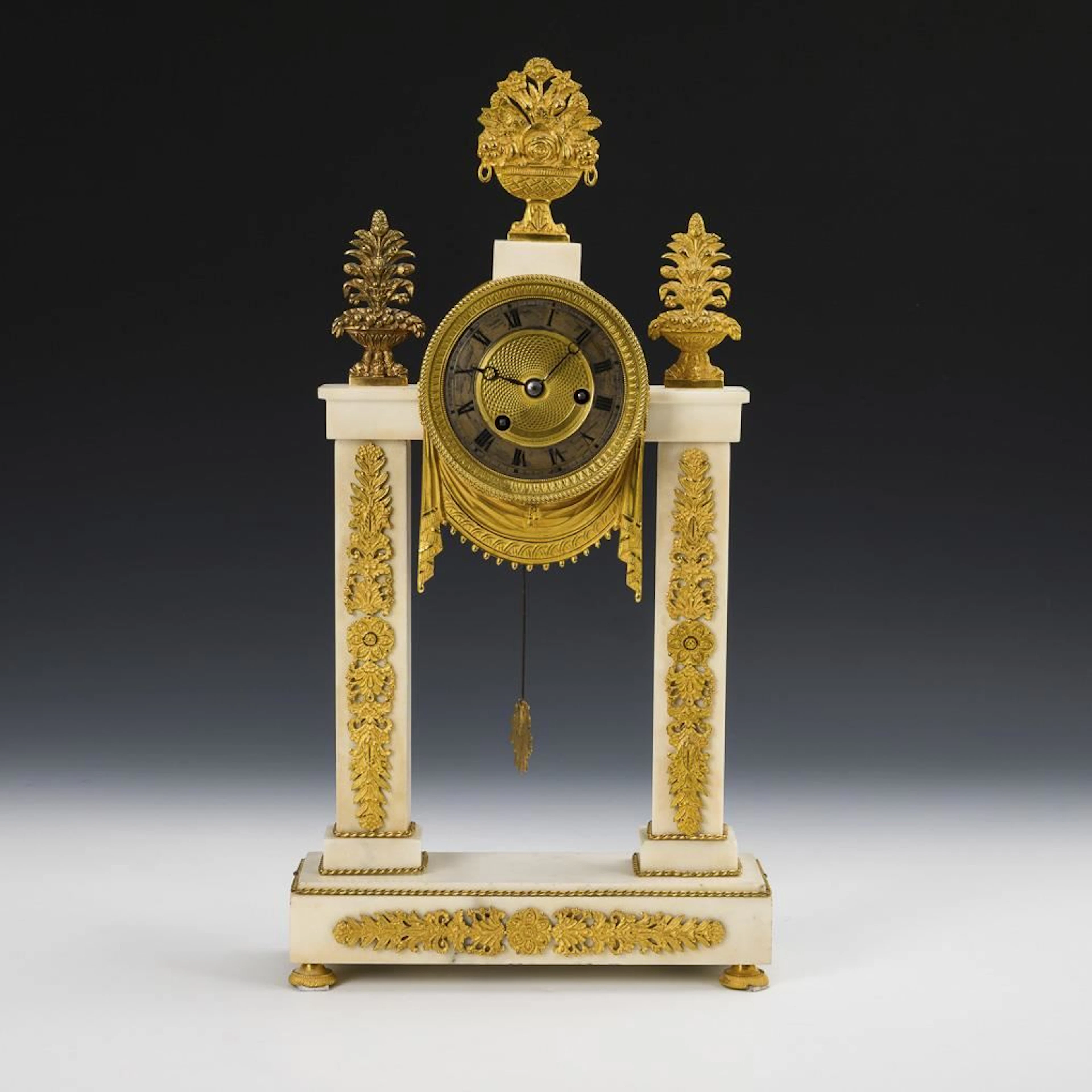 Historic portal clock with pilasters.