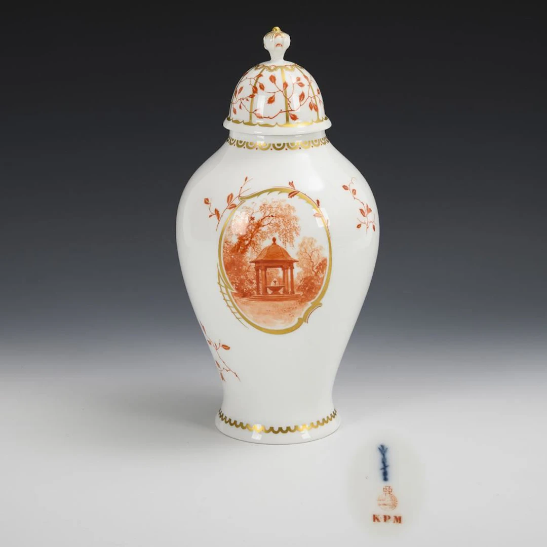 Lidded vase with coral-red decoration. KPM Berlin.