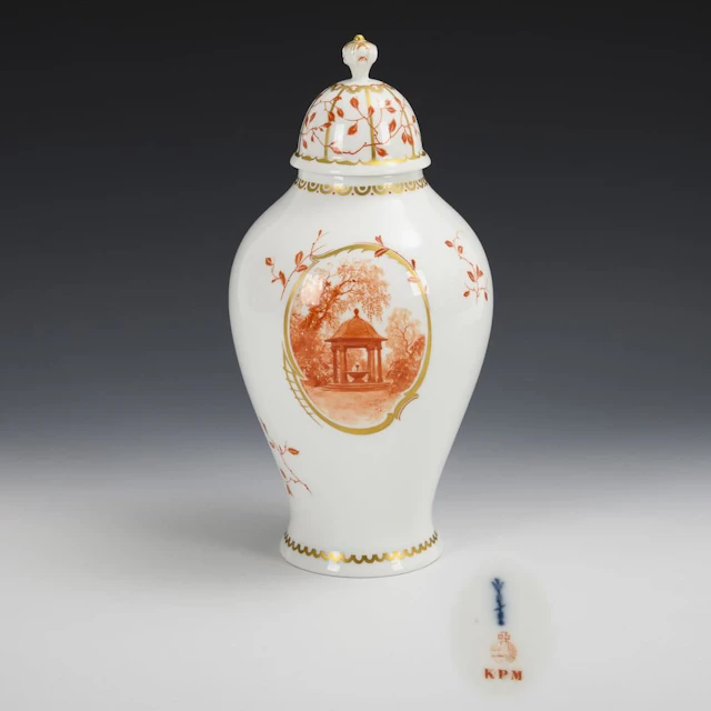 Lidded vase with coral-red decoration. KPM Berlin.