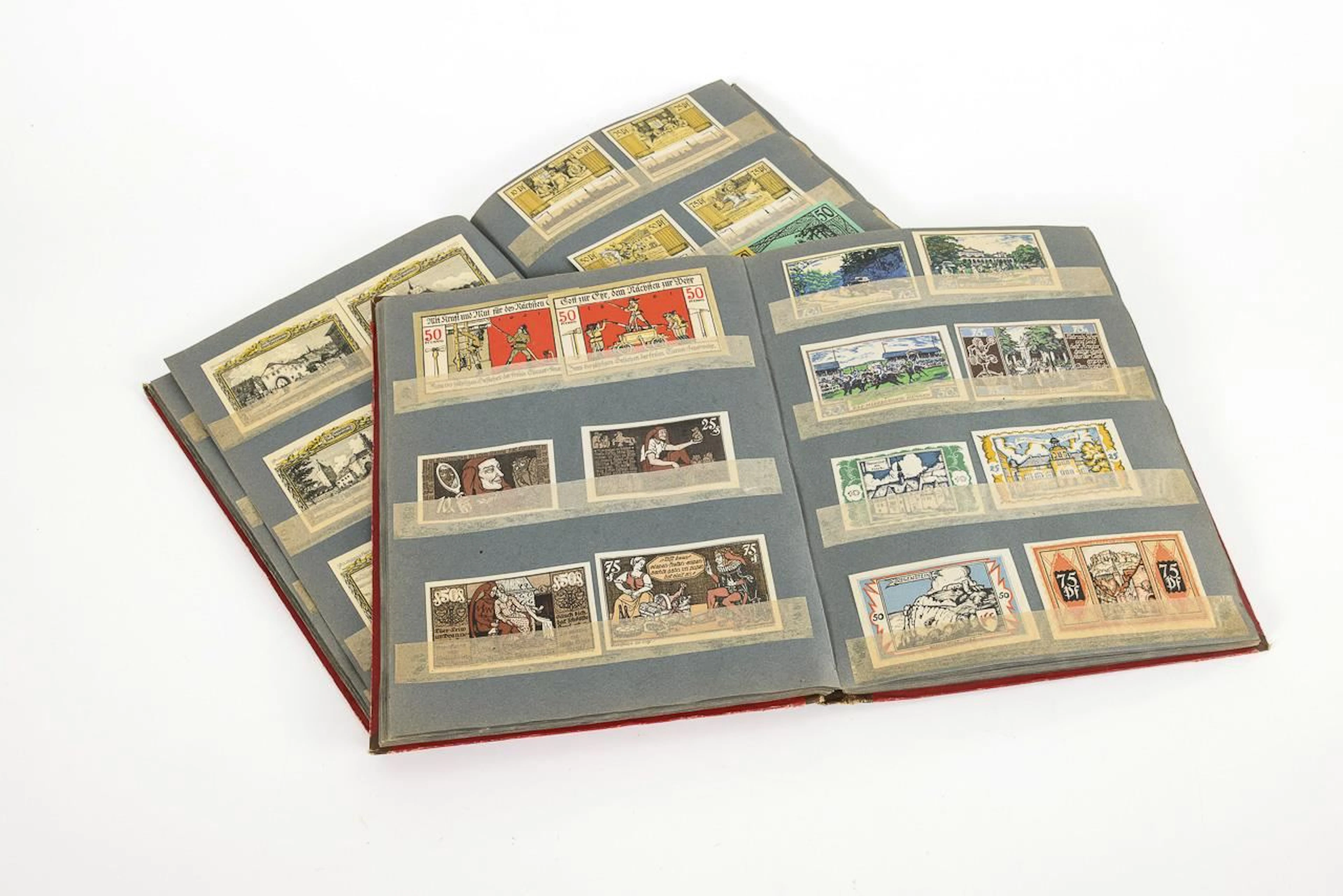 Two albums of emergency banknotes.