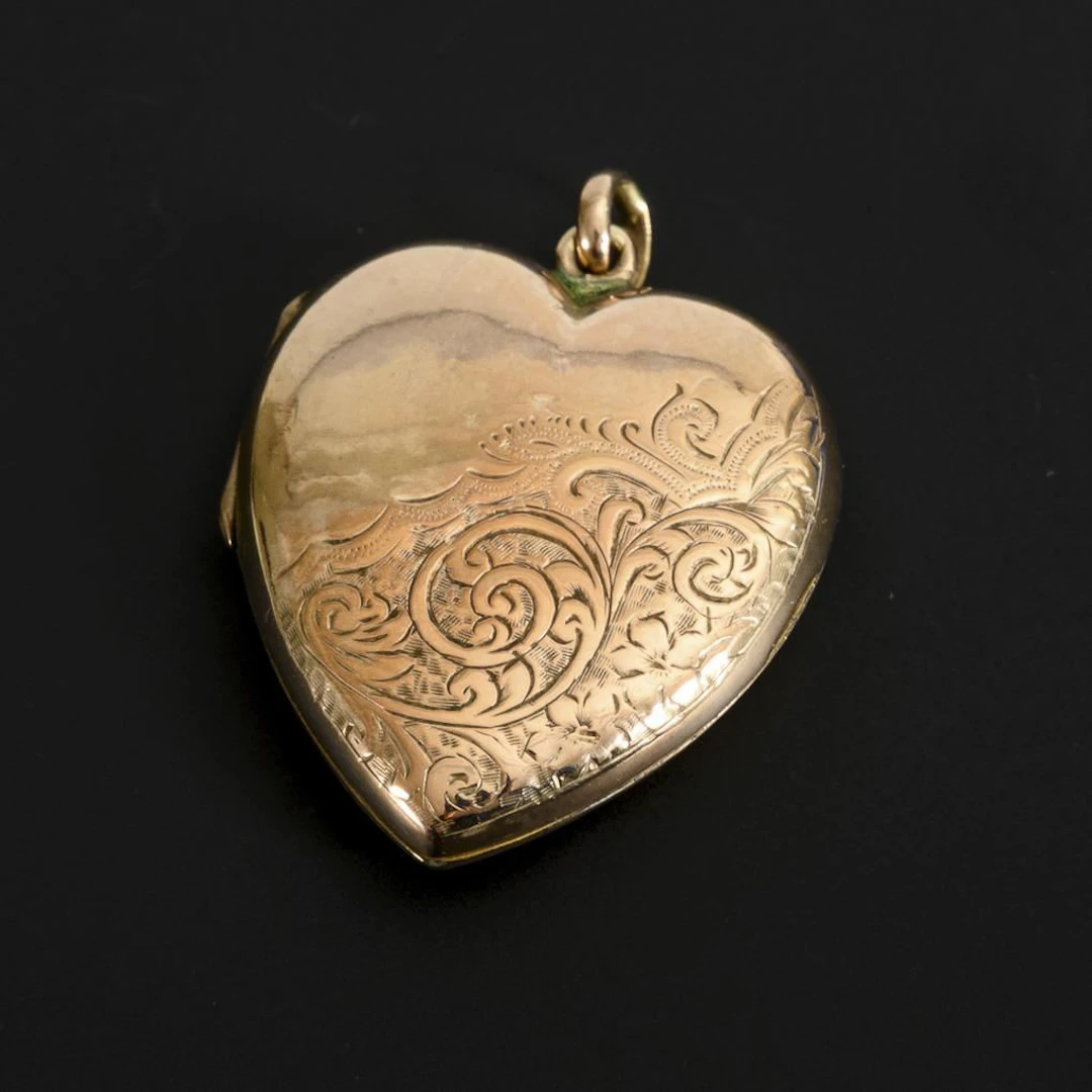 Heart-shaped medallion.
