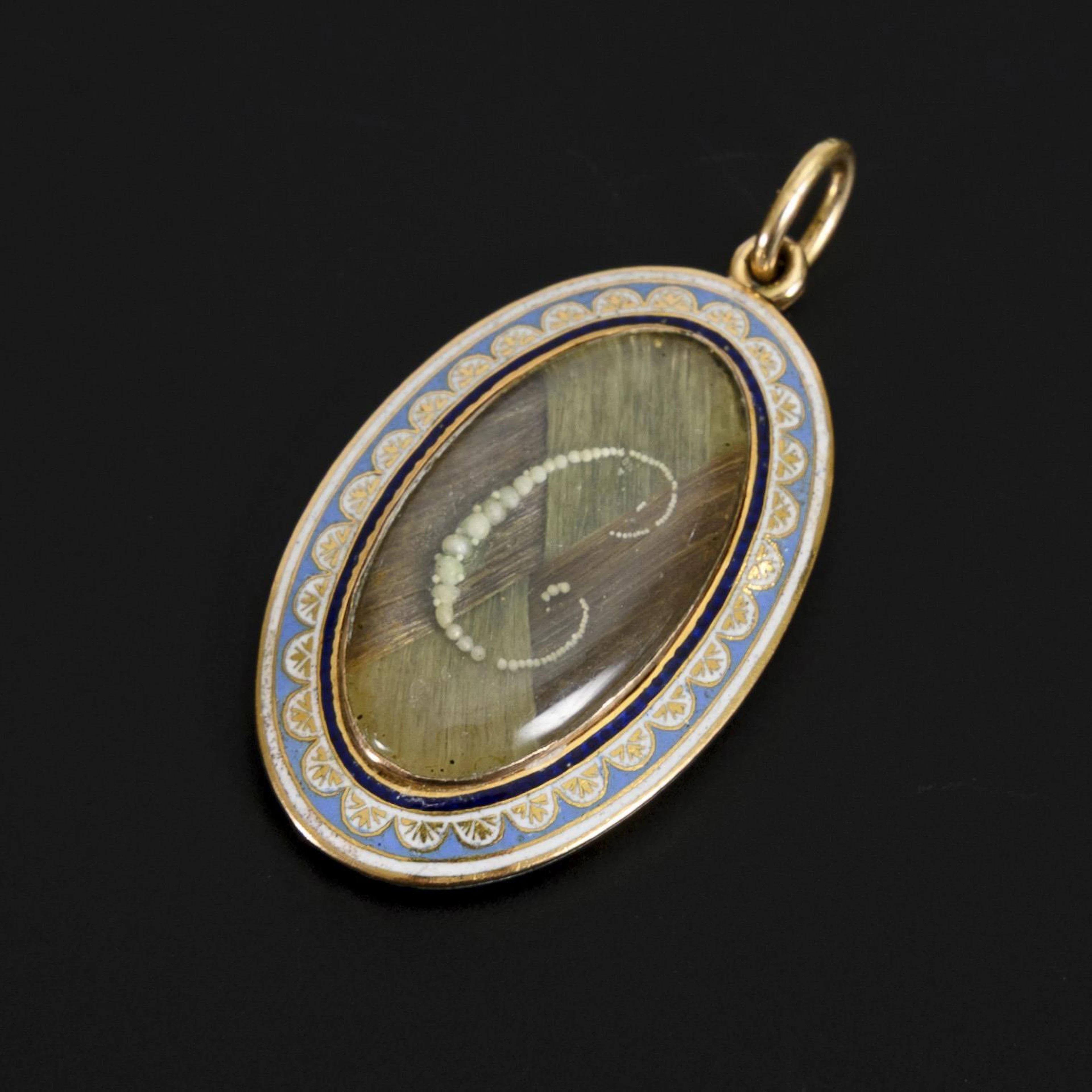 Historical keepsake pendant with hair inlay.