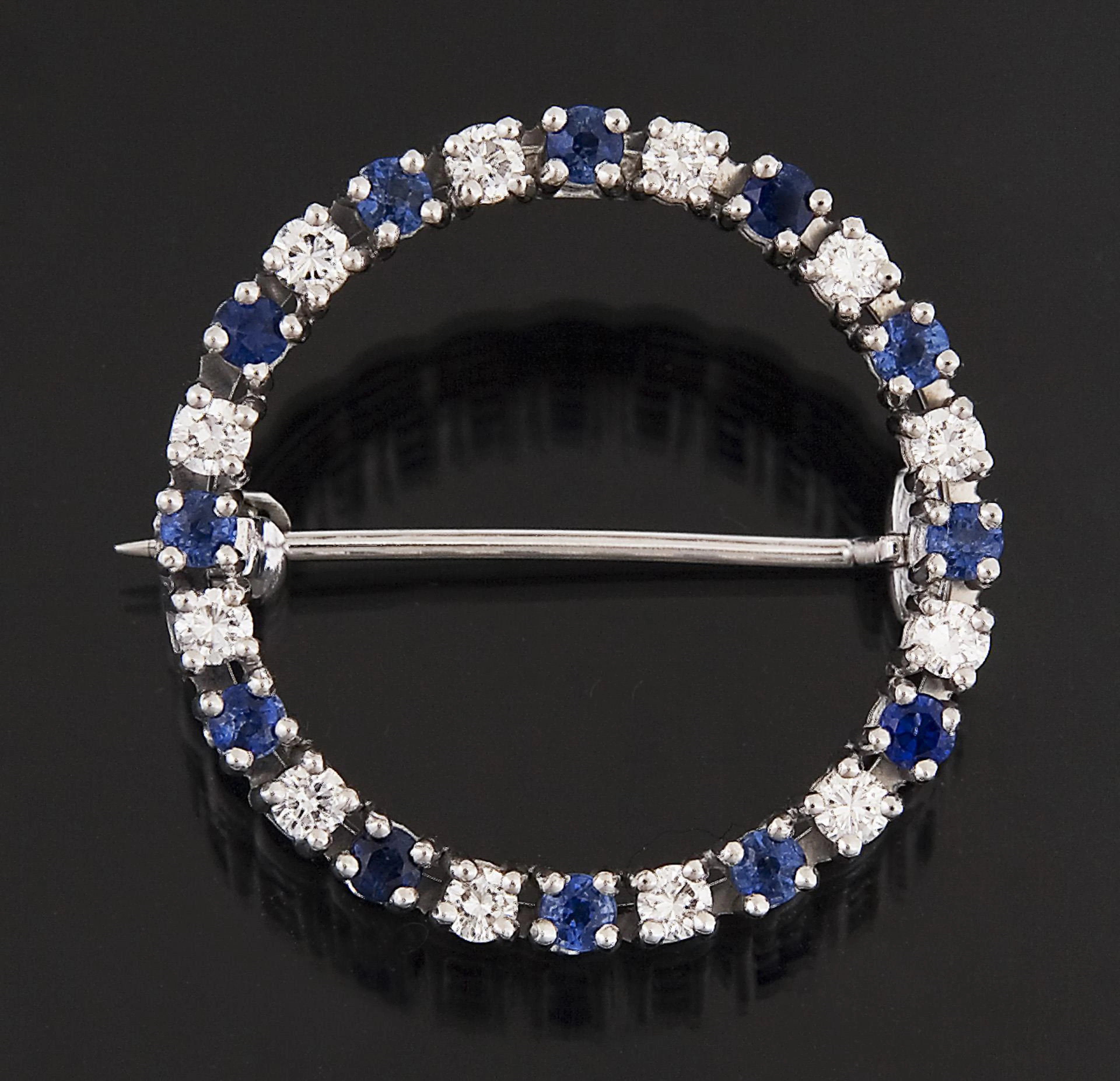 Sapphire diamond ring brooch. Carl Bucherer.