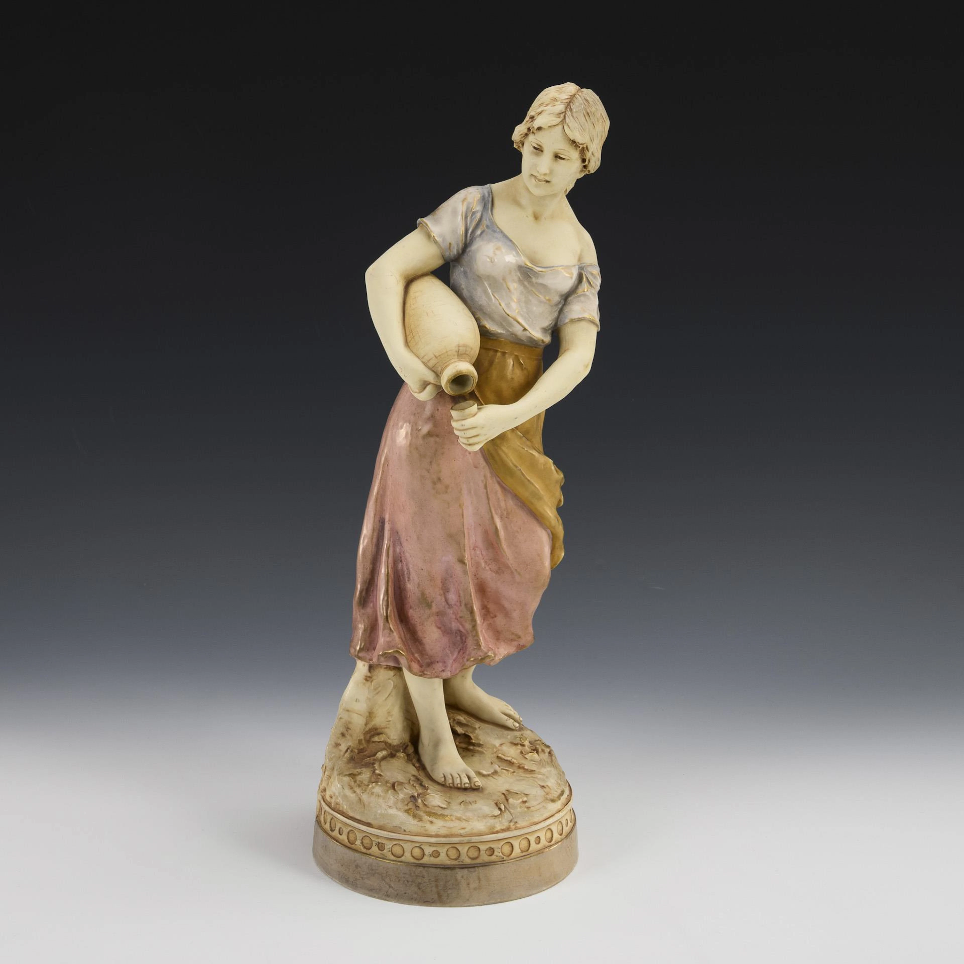 Woman with jug. Royal Dux.