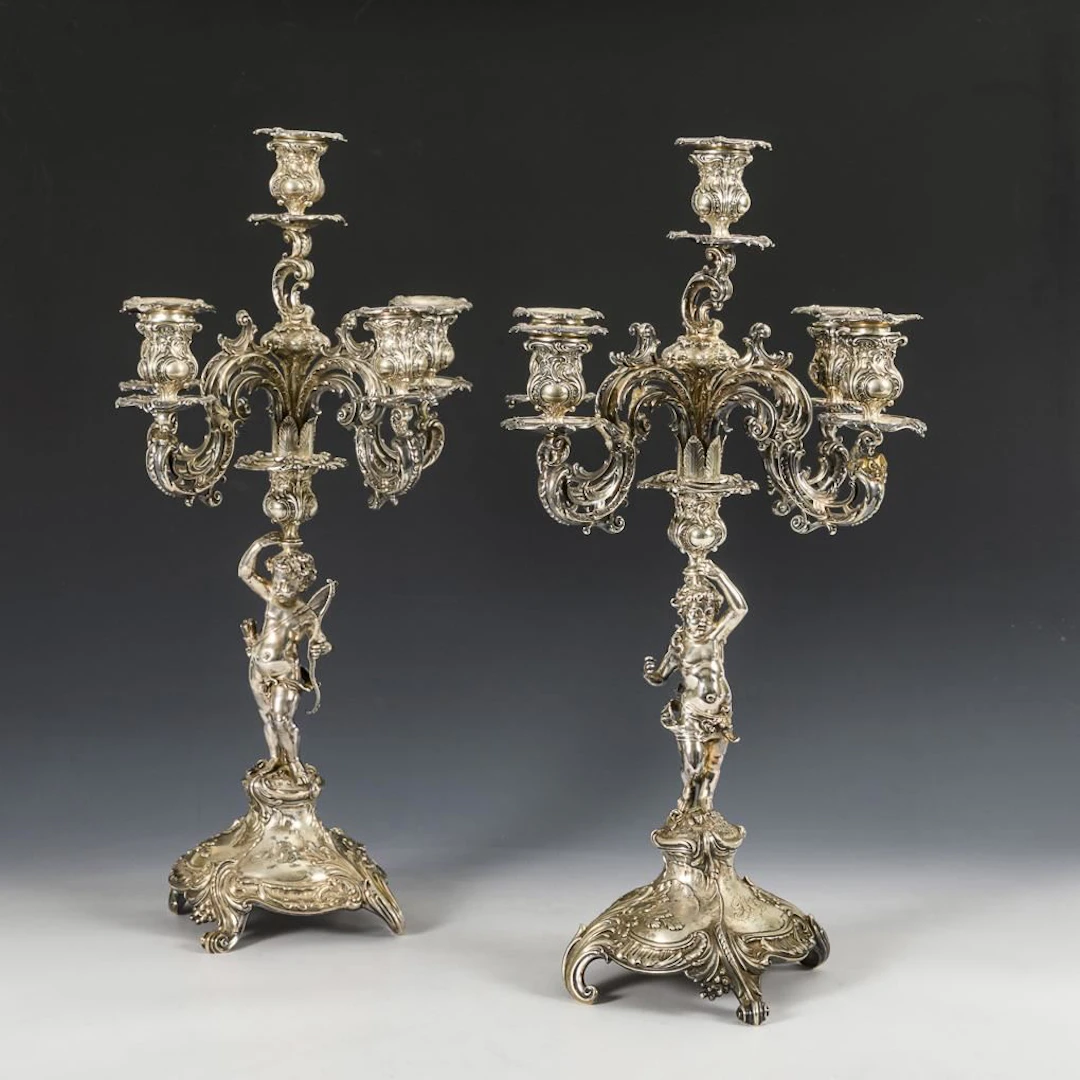 A pair of ornate silver candlesticks. Bruckmann & Söhne, Heilbronn.