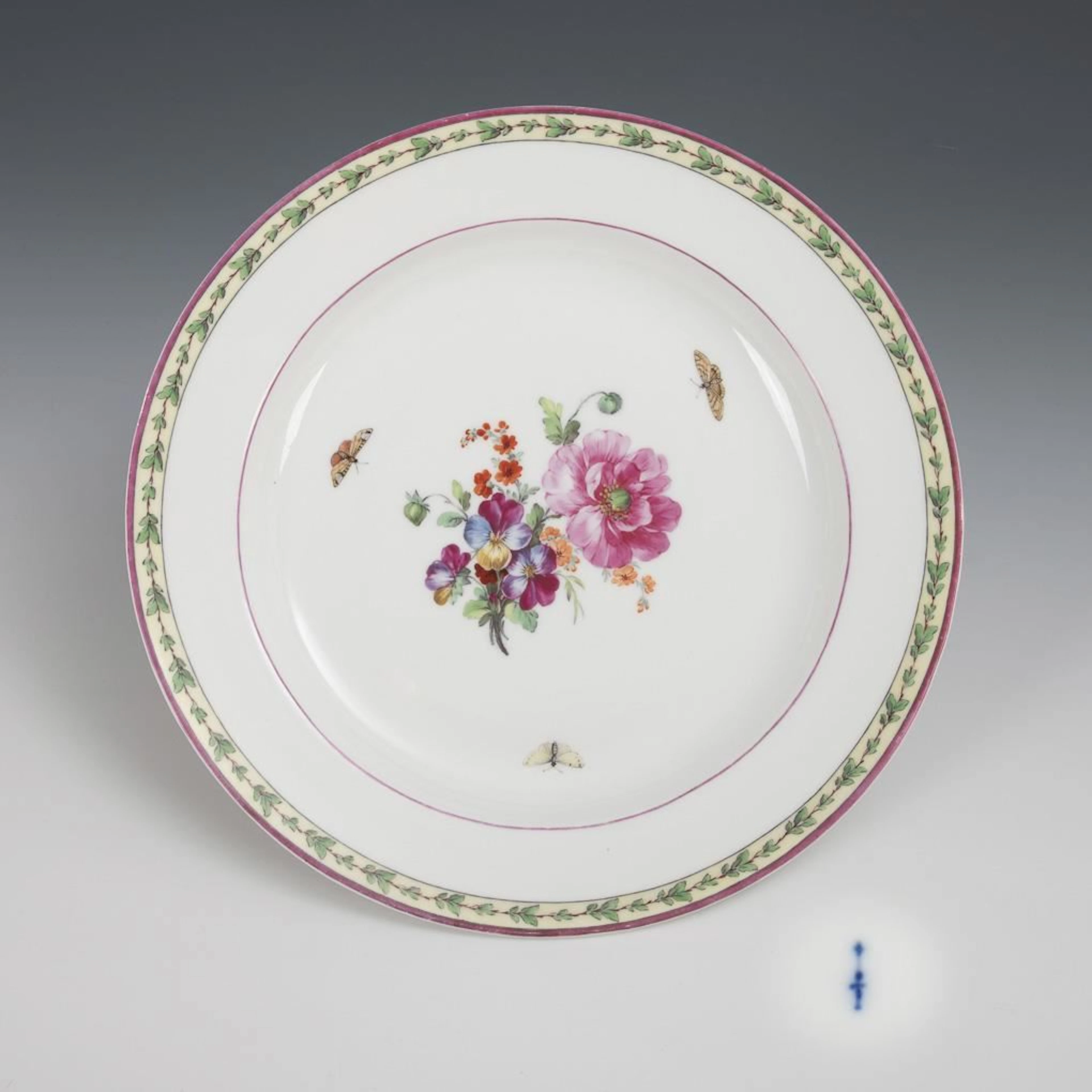 Empire-style plate with floral and insect motifs. KPM Berlin.