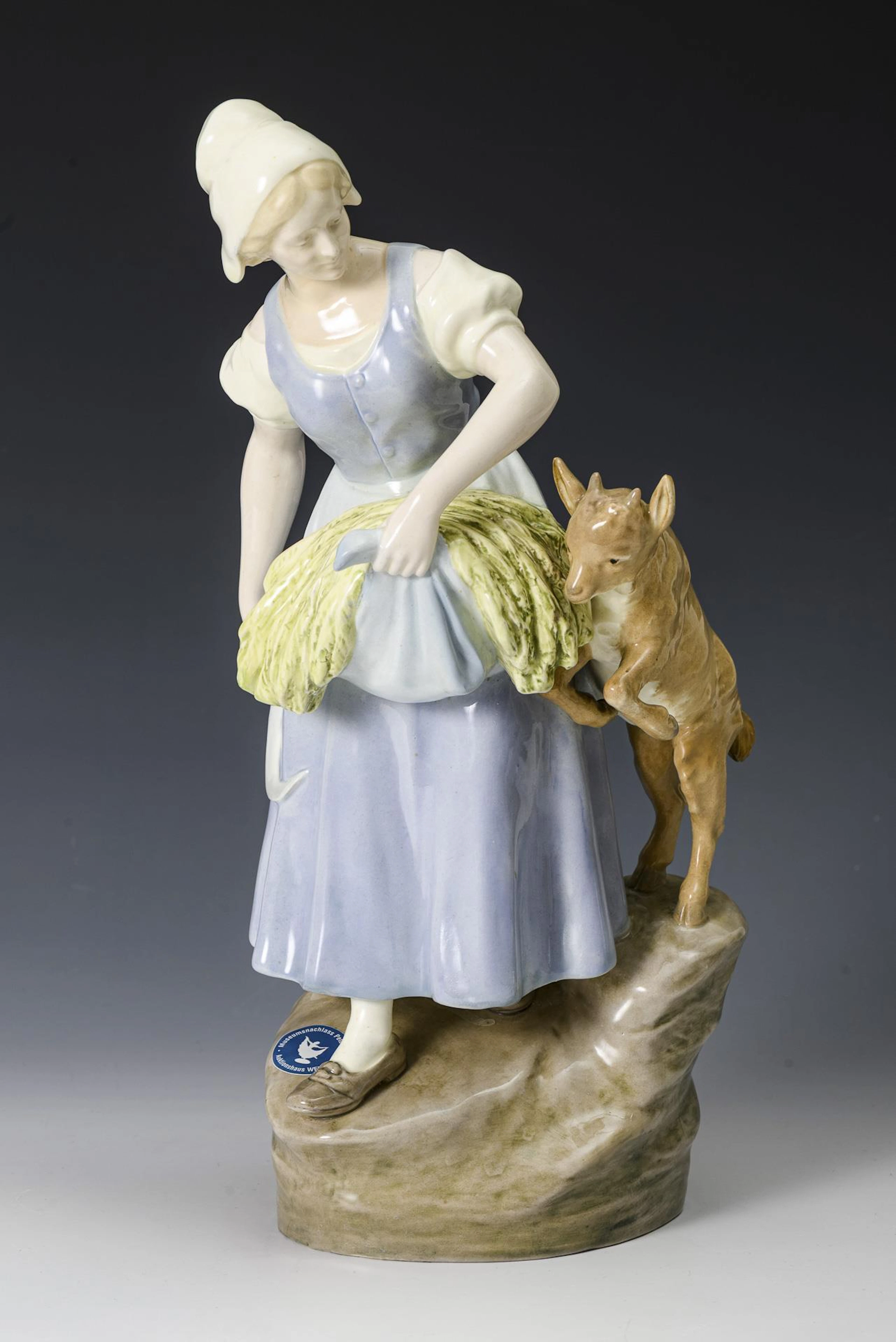 Art Nouveau figurine group "Dutch girl with kid". Vienna manufactory