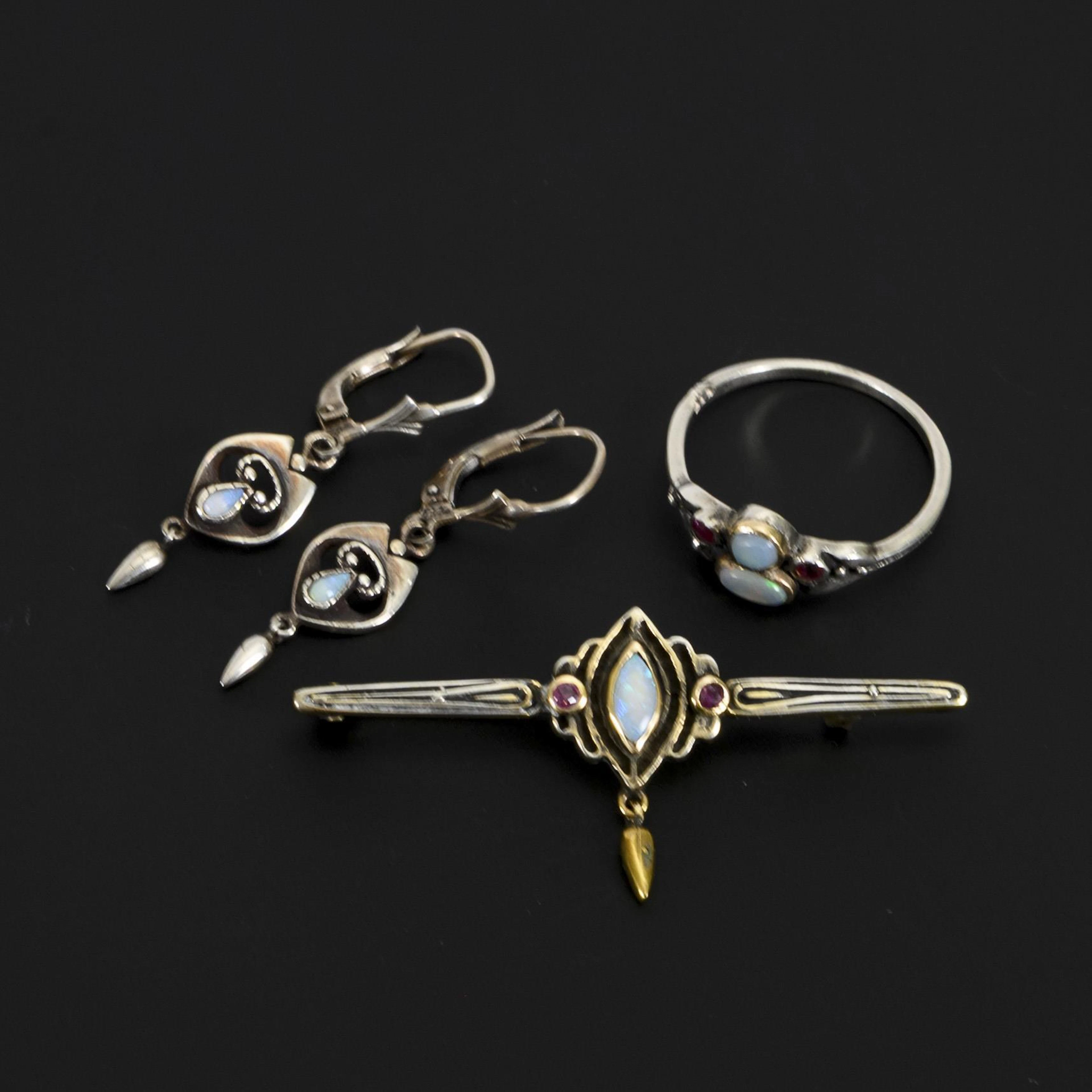 3 pieces of silver jewelry, stylistically inspired by Art Nouveau.