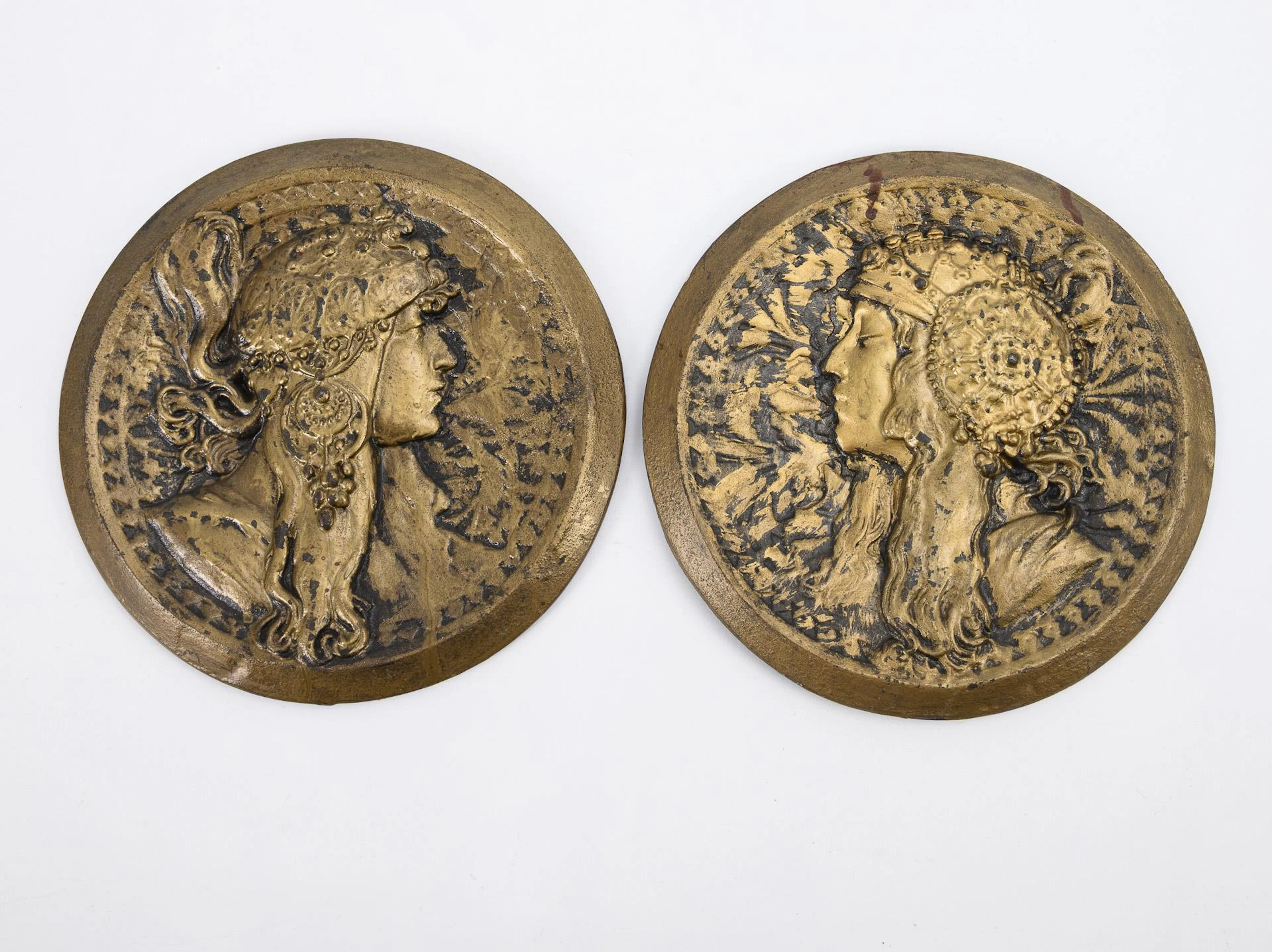 Pair of Art Nouveau wall medallions. Iron foundry Fürstlich Stolberg'sches