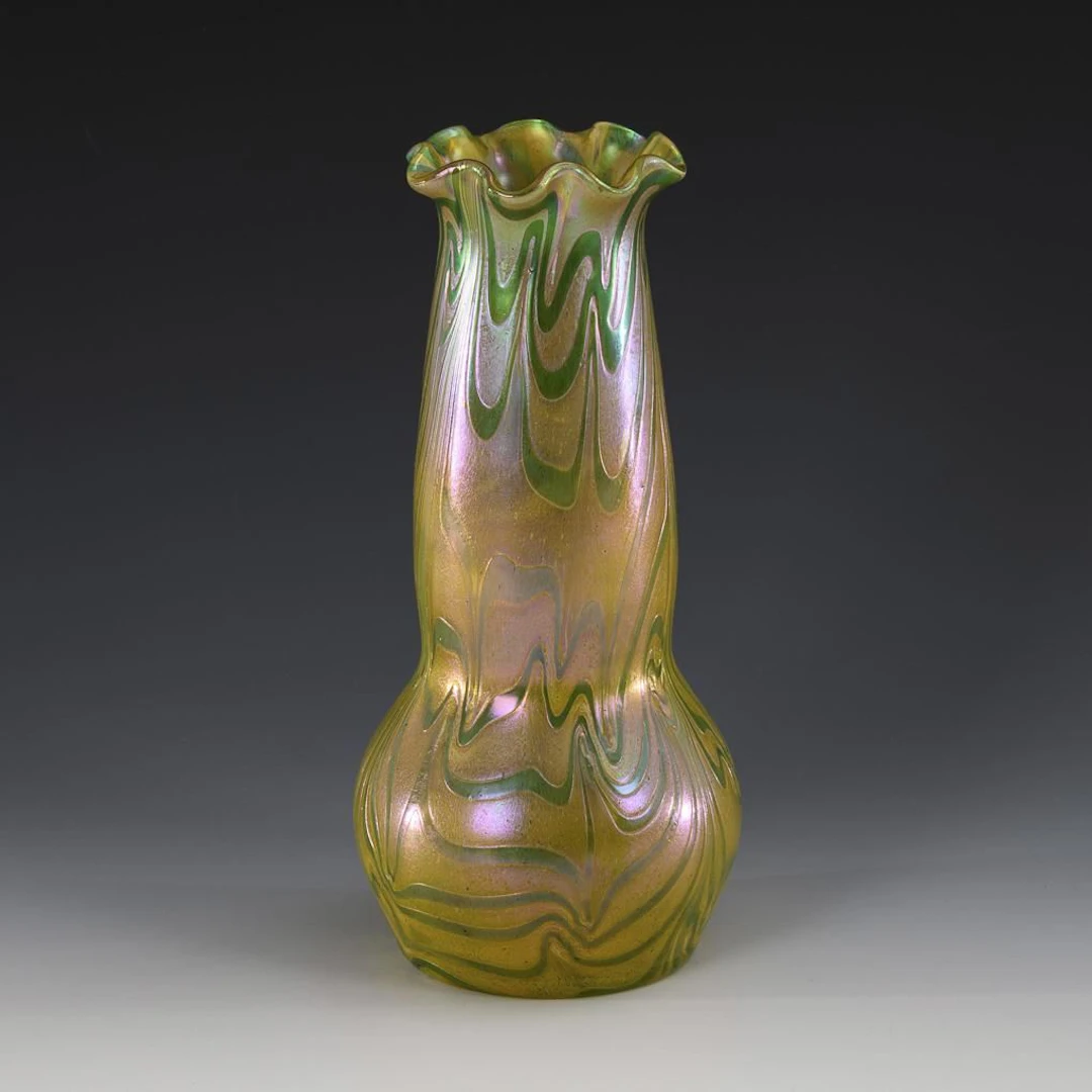 Art Nouveau vase with green ribbons on silver-yellow powder. Kralik.