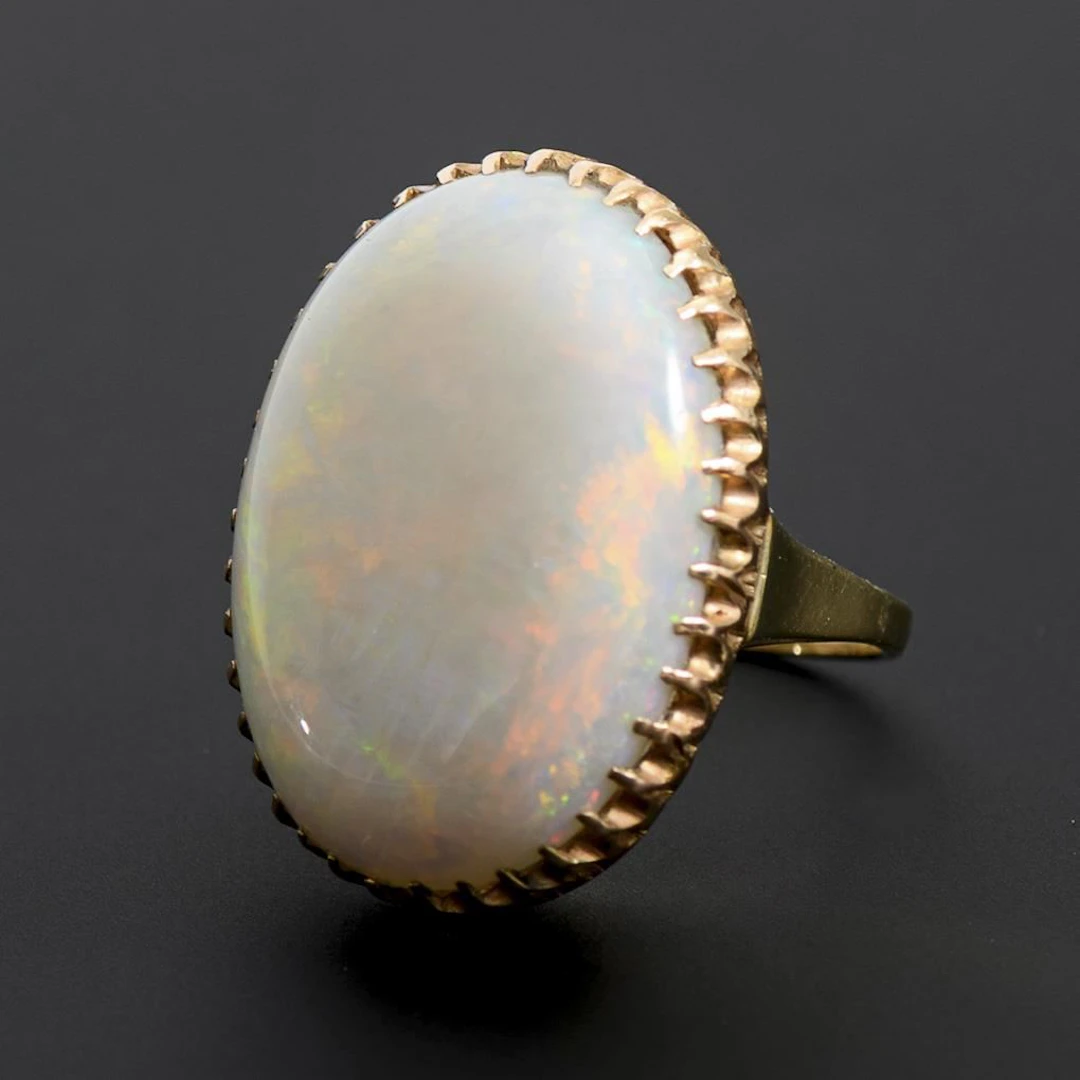 Ring with a large solid opal.