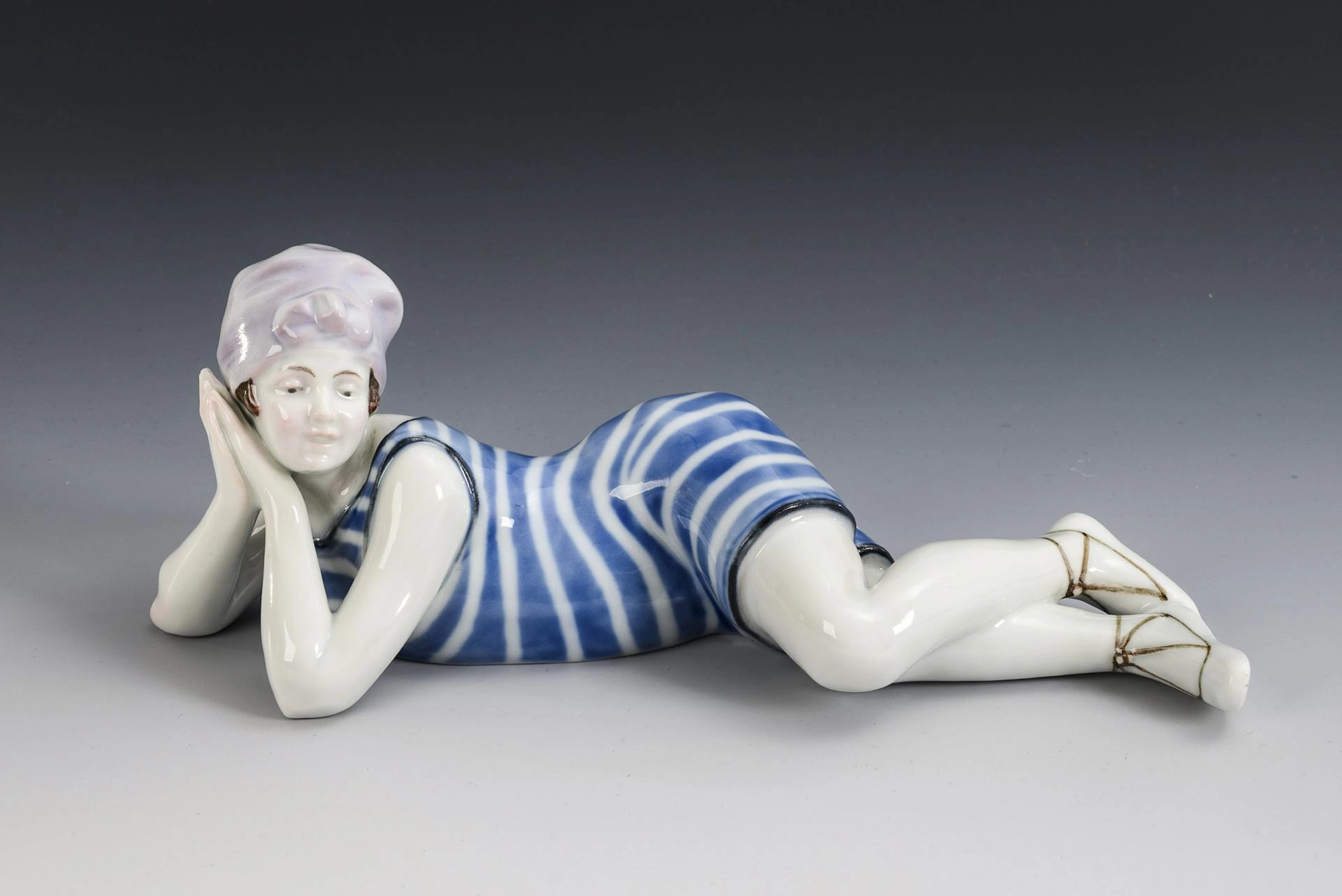 Art Nouveau figure: Reclining lady in bathing costume. ENS.