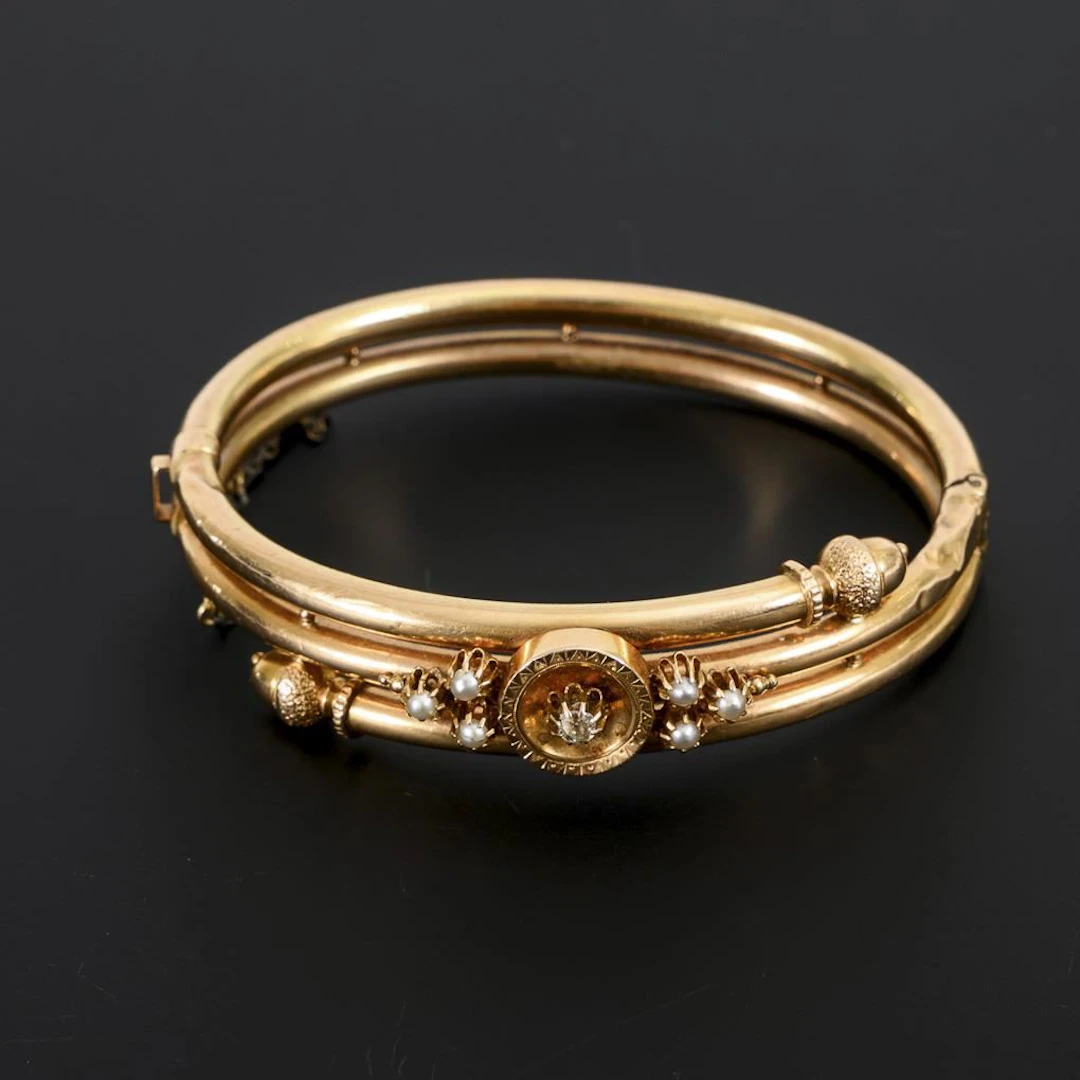 Historic bangle with diamond and seed pearls.